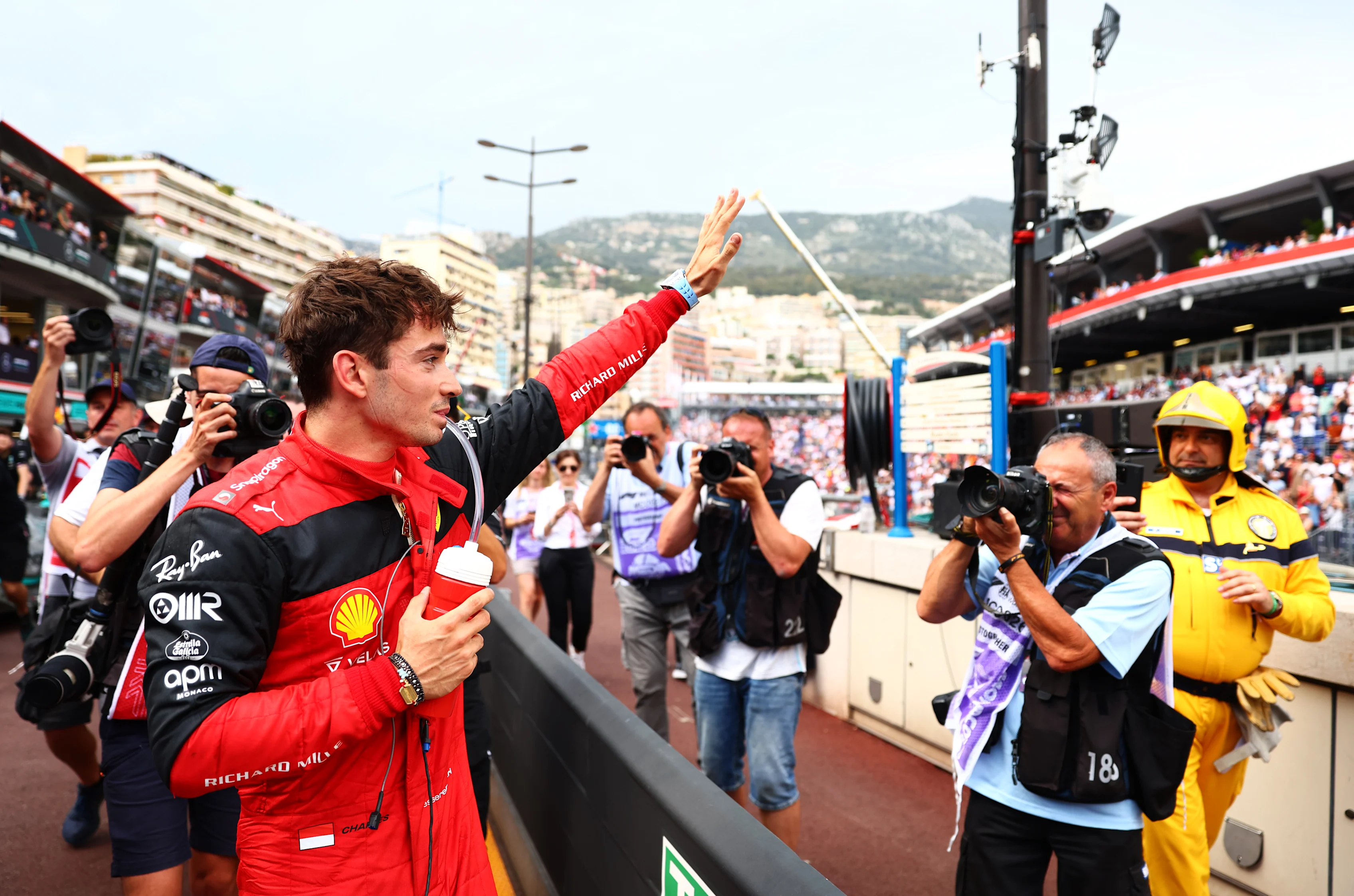 MONTE-CARLO, MONACO - MAY 28: Pole position qualifier Charles Leclerc of Monaco and Ferrari waves