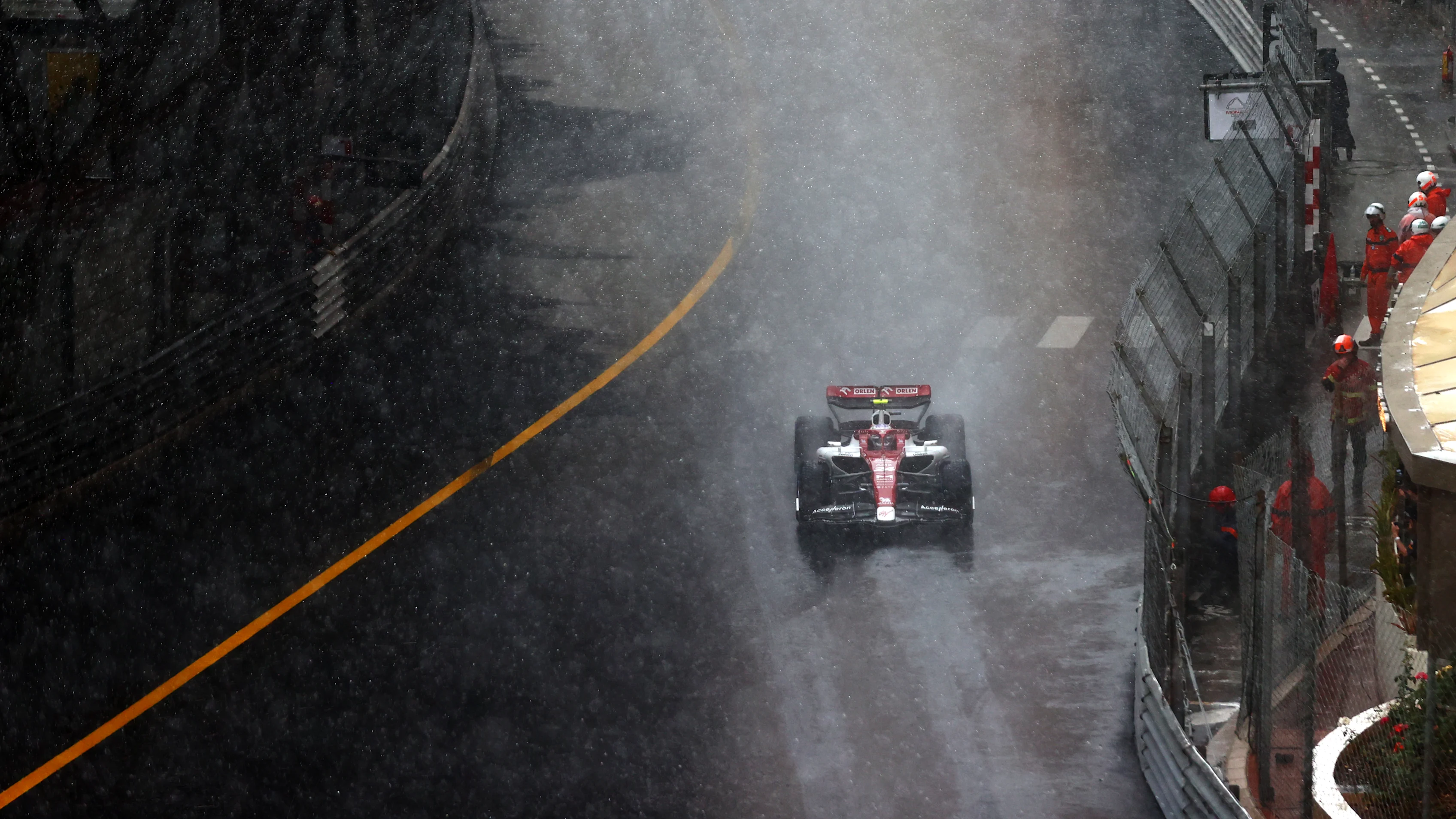 MONTE-CARLO, MONACO - MAY 29: Zhou Guanyu of China driving the (24) Alfa Romeo F1 C42 Ferrari on a formation lap in the rain during the F1 Grand Prix of Monaco at Circuit de Monaco on May 29, 2022 in Monte-Carlo, Monaco. (Photo by Dan Istitene - Formula 1/Formula 1 via Getty Images)