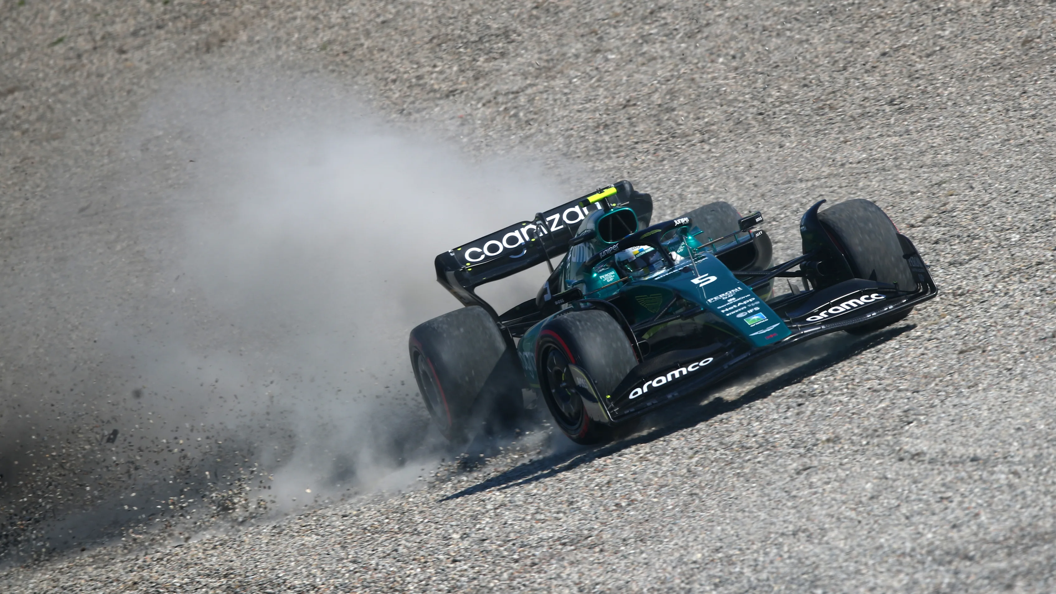 ZANDVOORT, NETHERLANDS - SEPTEMBER 03: Sebastian Vettel of Germany driving the (5) Aston Martin AMR22 Mercedes runs wide during qualifying ahead of the F1 Grand Prix of The Netherlands at Circuit Zandvoort on September 03, 2022 in Zandvoort, Netherlands. (Photo by Joe Portlock - Formula 1/Formula 1 via Getty Images)