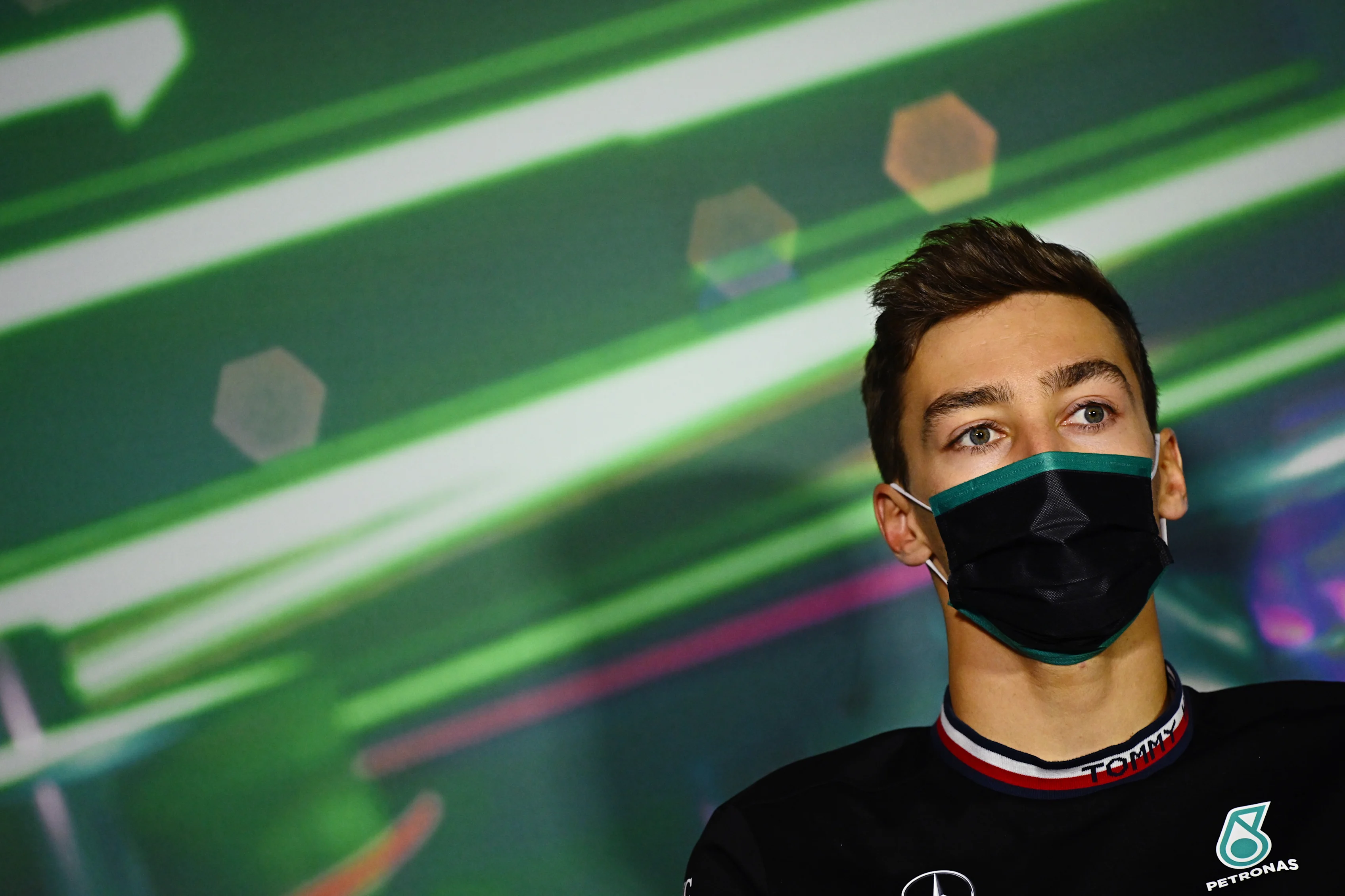 JEDDAH, SAUDI ARABIA - MARCH 25: George Russell of Great Britain and Mercedes looks on in the Drivers Press Conference before practice ahead of the F1 Grand Prix of Saudi Arabia at the Jeddah Corniche Circuit on March 25, 2022 in Jeddah, Saudi Arabia. (Photo by Clive Mason/Getty Images)