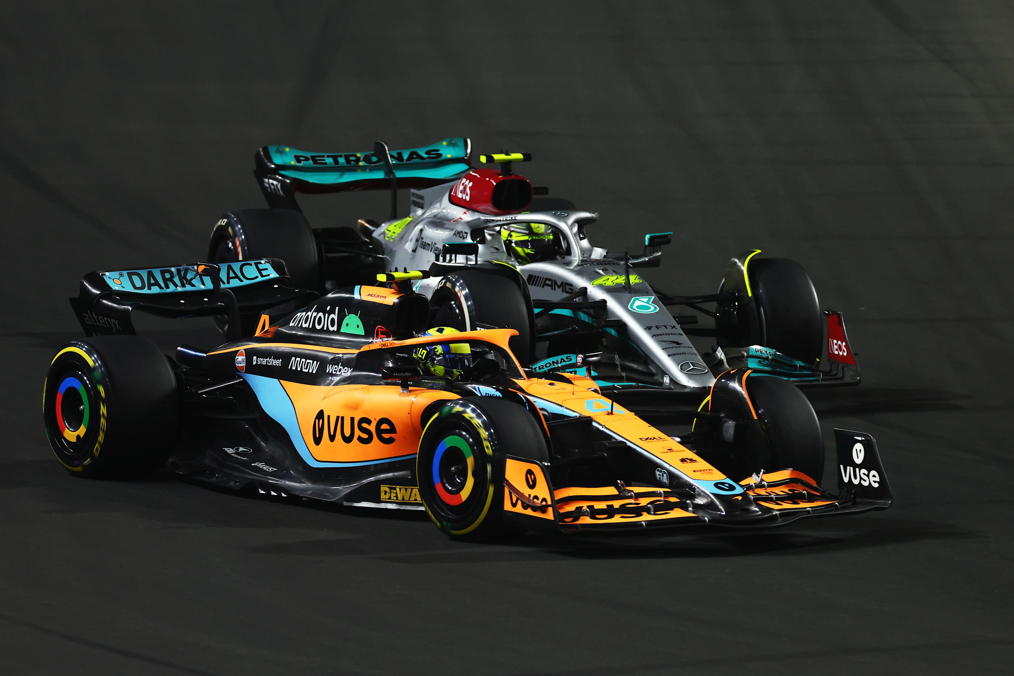 JEDDAH, SAUDI ARABIA - MARCH 27: Lando Norris of Great Britain driving the (4) McLaren MCL36 Mercedes leads Lewis Hamilton of Great Britain driving the (44) Mercedes AMG Petronas F1 Team W13  during the F1 Grand Prix of Saudi Arabia at the Jeddah Corniche Circuit on March 27, 2022 in Jeddah, Saudi Arabia. (Photo by Lars Baron/Getty Images)