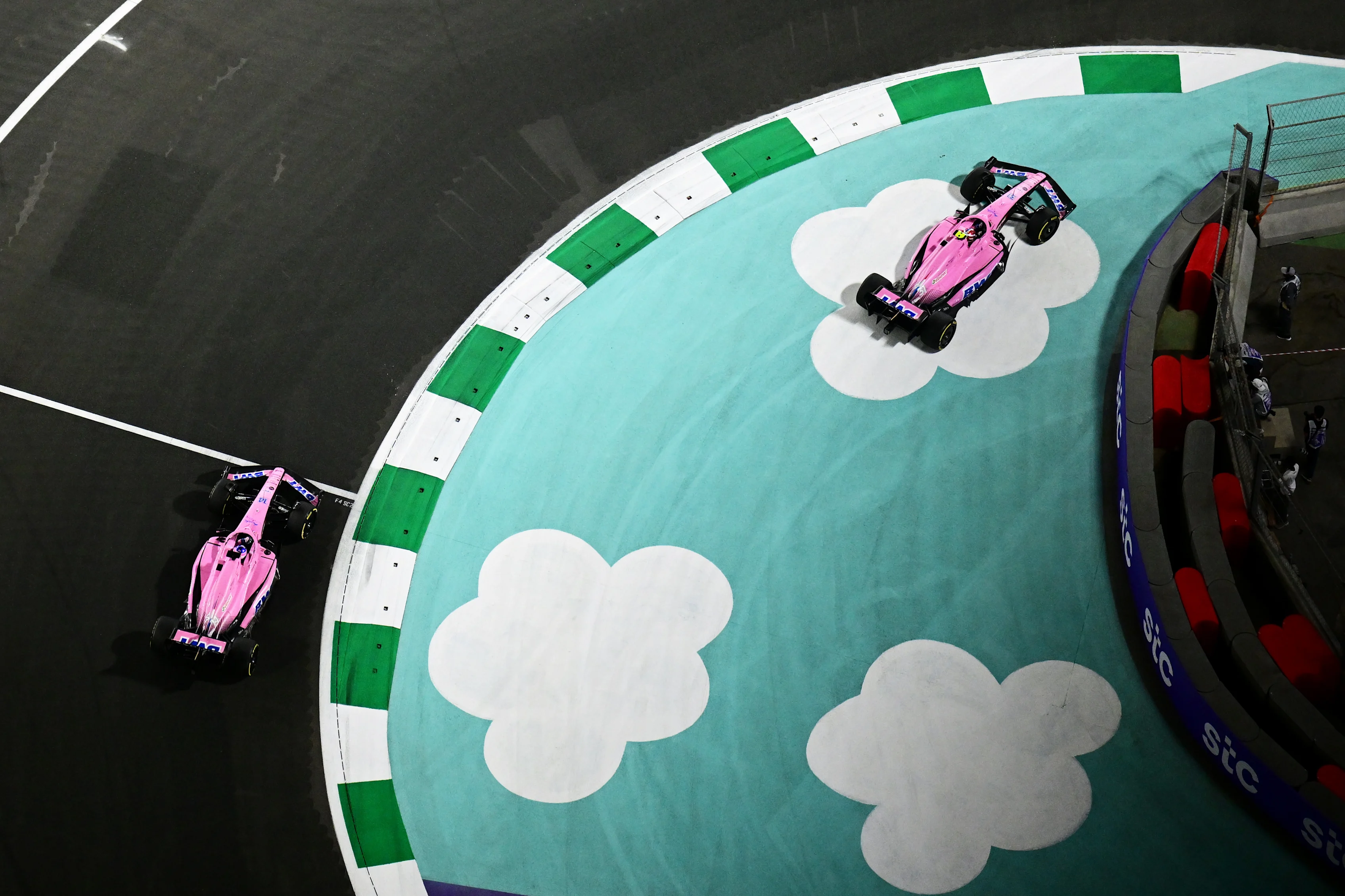 JEDDAH, SAUDI ARABIA - MARCH 27: Esteban Ocon of France driving the (31) Alpine F1 A522 Renault runs wide ahead of Fernando Alonso of Spain driving the (14) Alpine F1 A522 Renault during the F1 Grand Prix of Saudi Arabia at the Jeddah Corniche Circuit on March 27, 2022 in Jeddah, Saudi Arabia. (Photo by Clive Mason/Getty Images)
