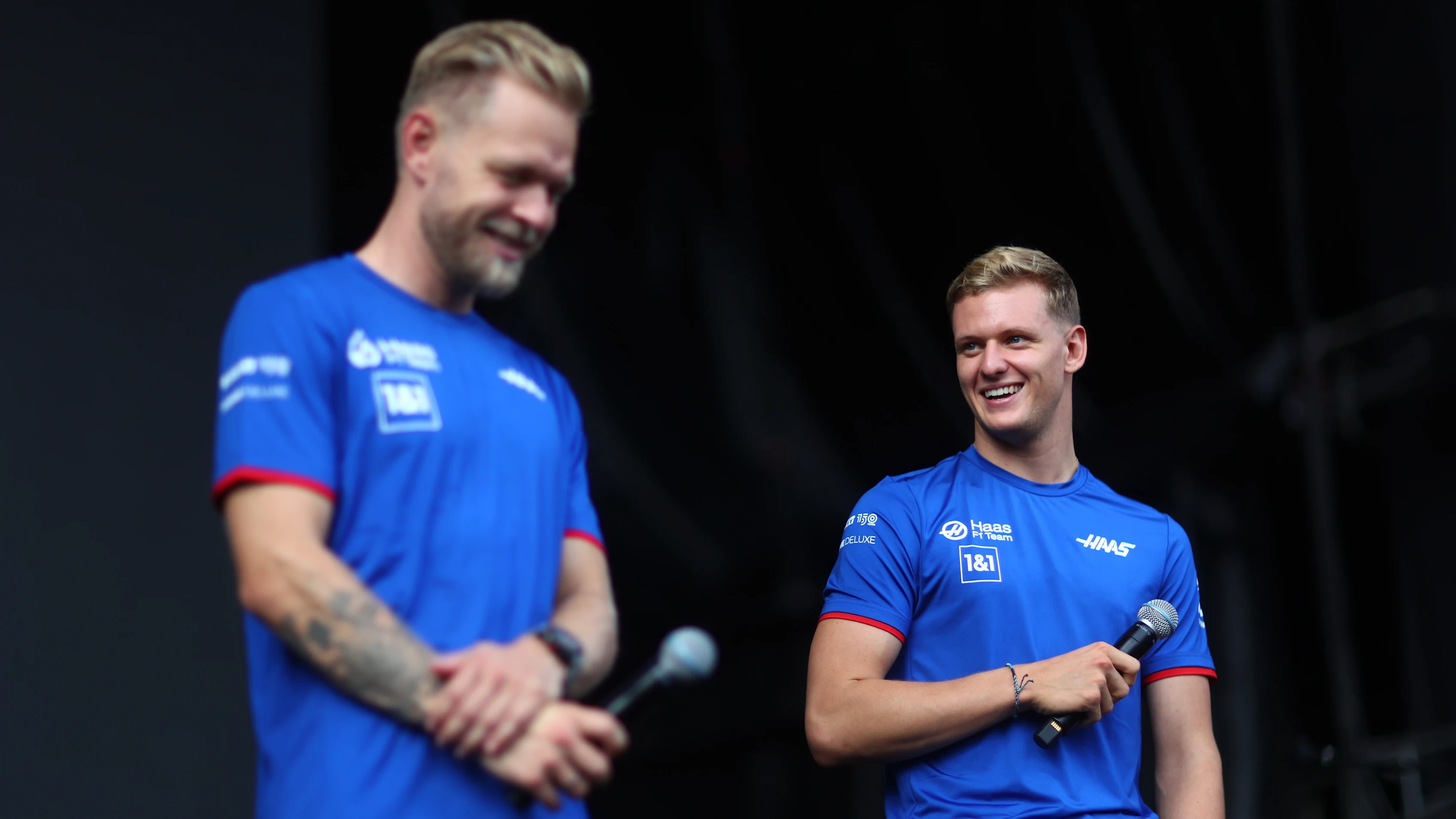 SINGAPORE, SINGAPORE - SEPTEMBER 30: Mick Schumacher of Germany and Haas F1 and Kevin Magnussen of
