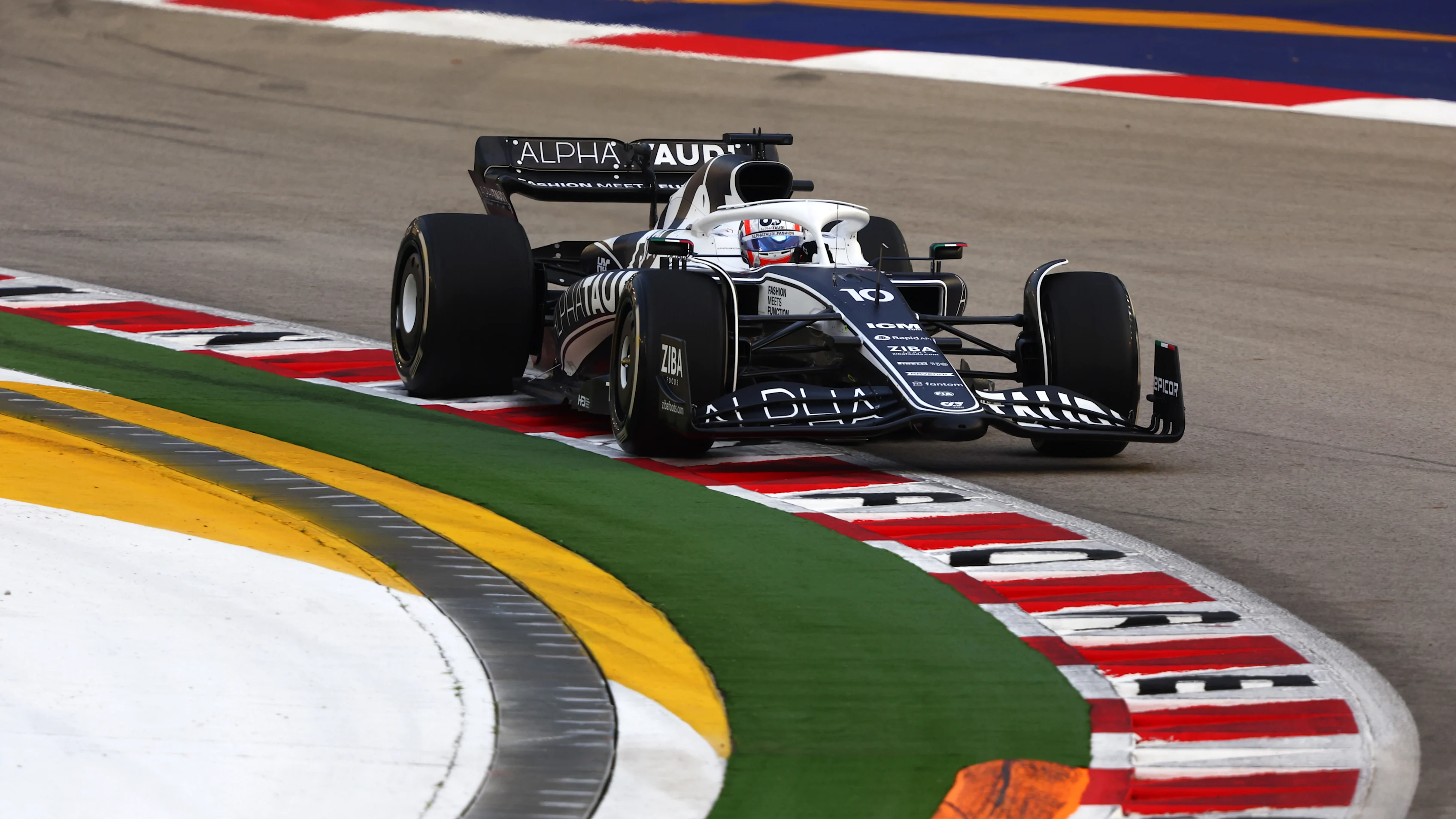 SINGAPORE, SINGAPORE - SEPTEMBER 30: Pierre Gasly of France driving the (10) Scuderia AlphaTauri AT03 on track during practice ahead of the F1 Grand Prix of Singapore at Marina Bay Street Circuit on September 30, 2022 in Singapore, Singapore. (Photo by Bryn Lennon - Formula 1/Formula 1 via Getty Images)