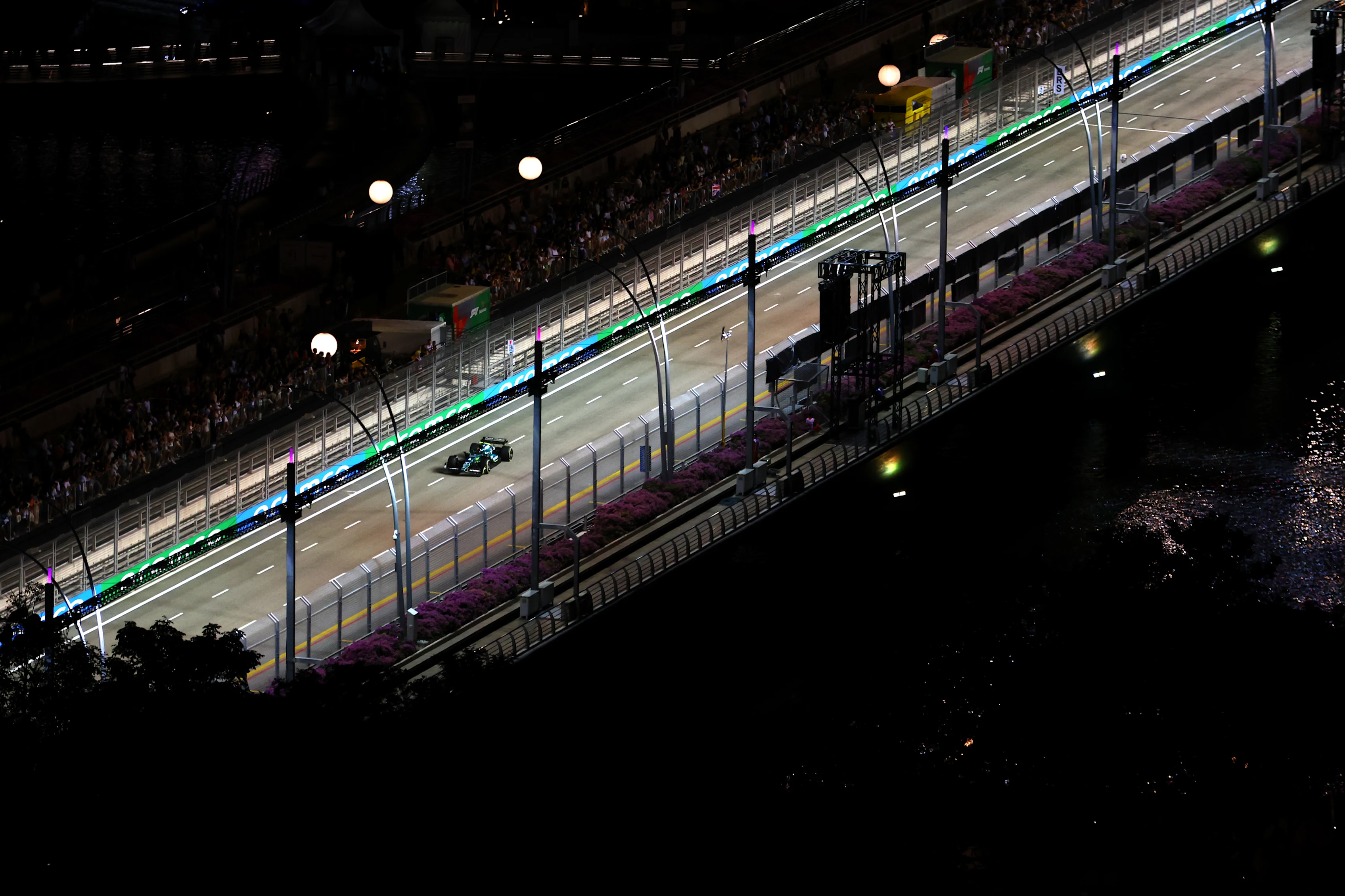 SINGAPORE, SINGAPORE - SEPTEMBER 30: Sebastian Vettel of Germany driving the (5) Aston Martin AMR22 Mercedes on track during practice ahead of the F1 Grand Prix of Singapore at Marina Bay Street Circuit on September 30, 2022 in Singapore, Singapore. (Photo by Bryn Lennon - Formula 1/Formula 1 via Getty Images)