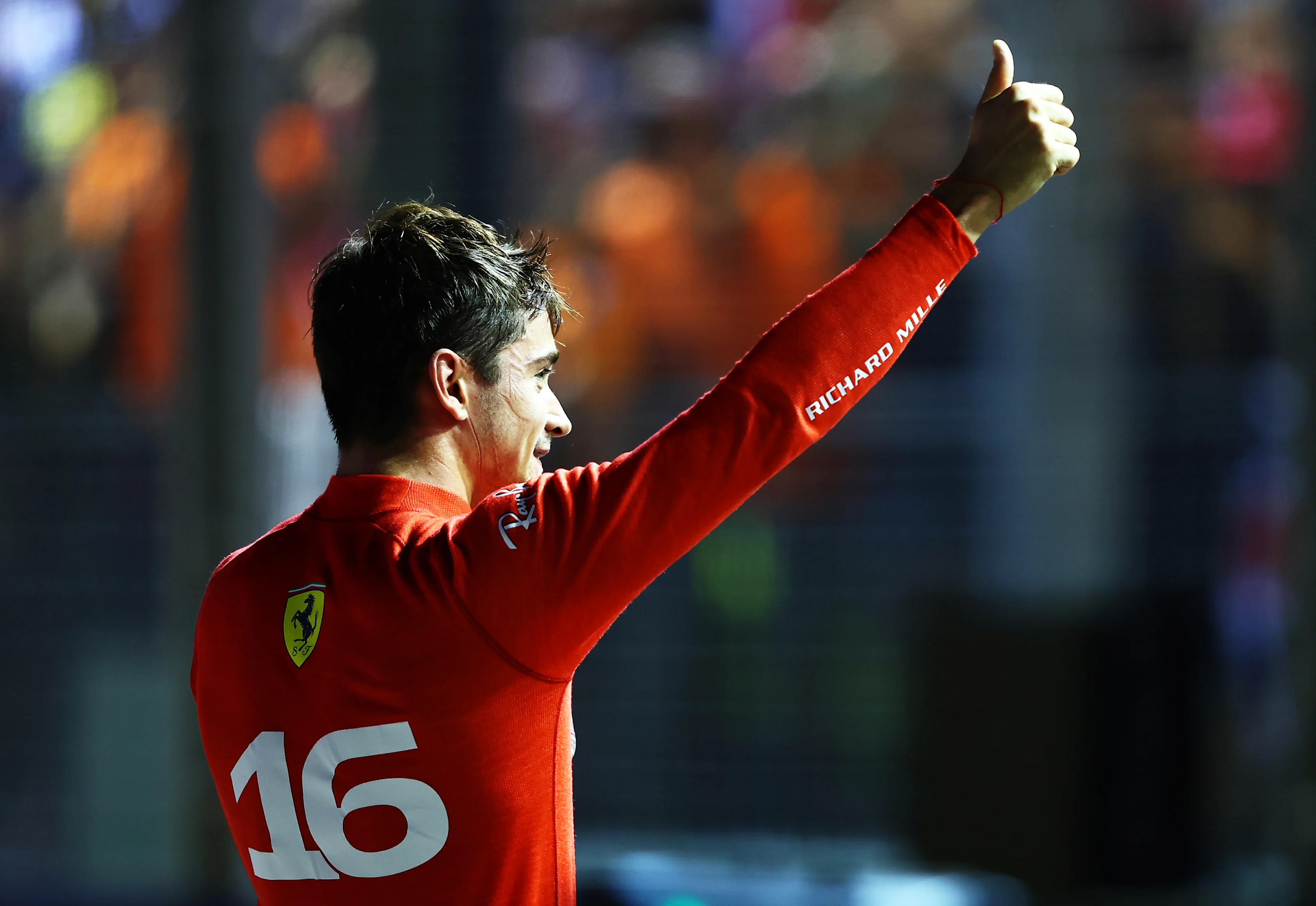 SINGAPORE, SINGAPORE - OCTOBER 01: Pole position qualifier Charles Leclerc of Monaco and Ferrari