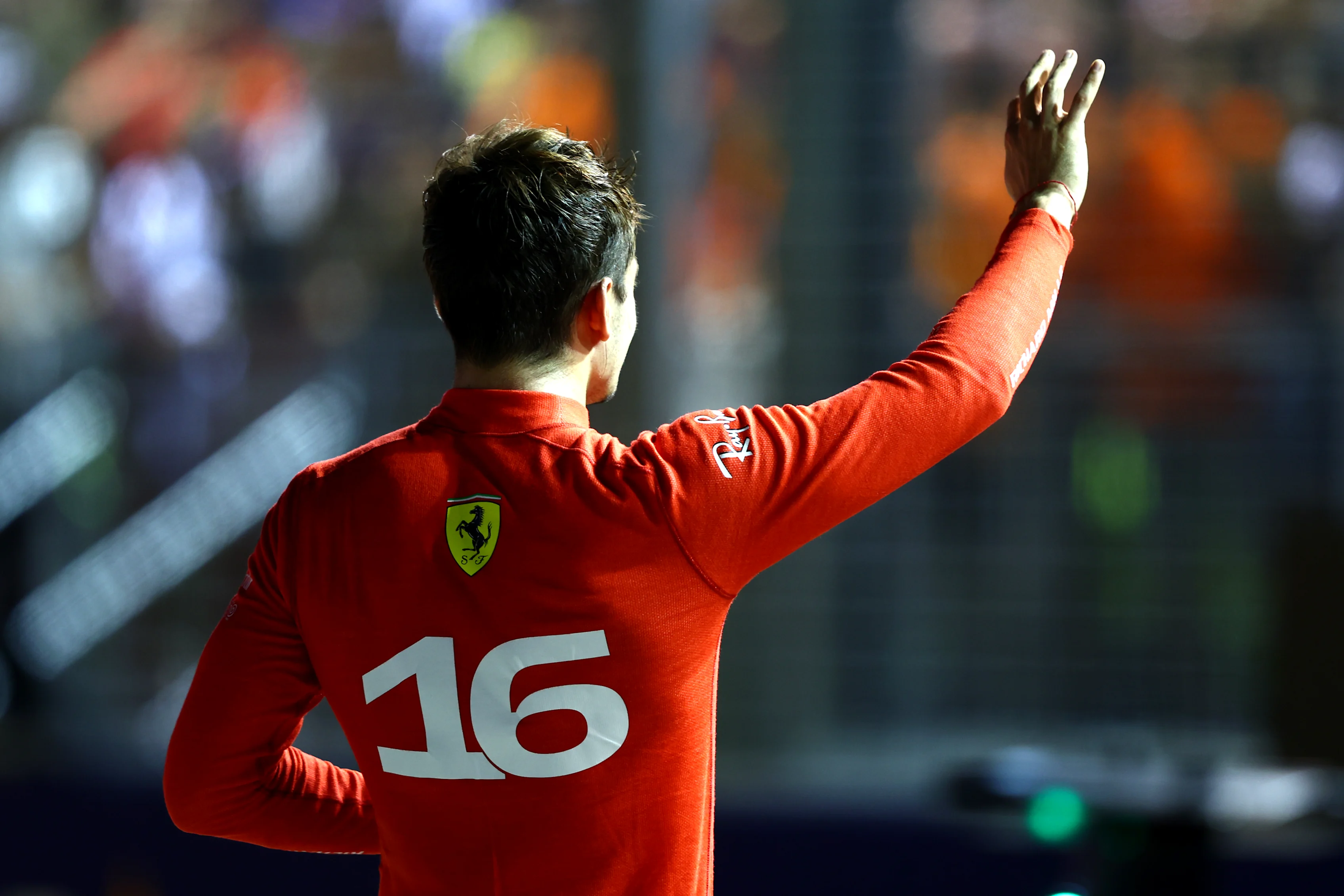 SINGAPORE, SINGAPORE - OCTOBER 01: Pole position qualifier Charles Leclerc of Monaco and Ferrari celebrates in parc ferme during qualifying ahead of the F1 Grand Prix of Singapore at Marina Bay Street Circuit on October 01, 2022 in Singapore, Singapore. (Photo by Mark Thompson/Getty Images,)