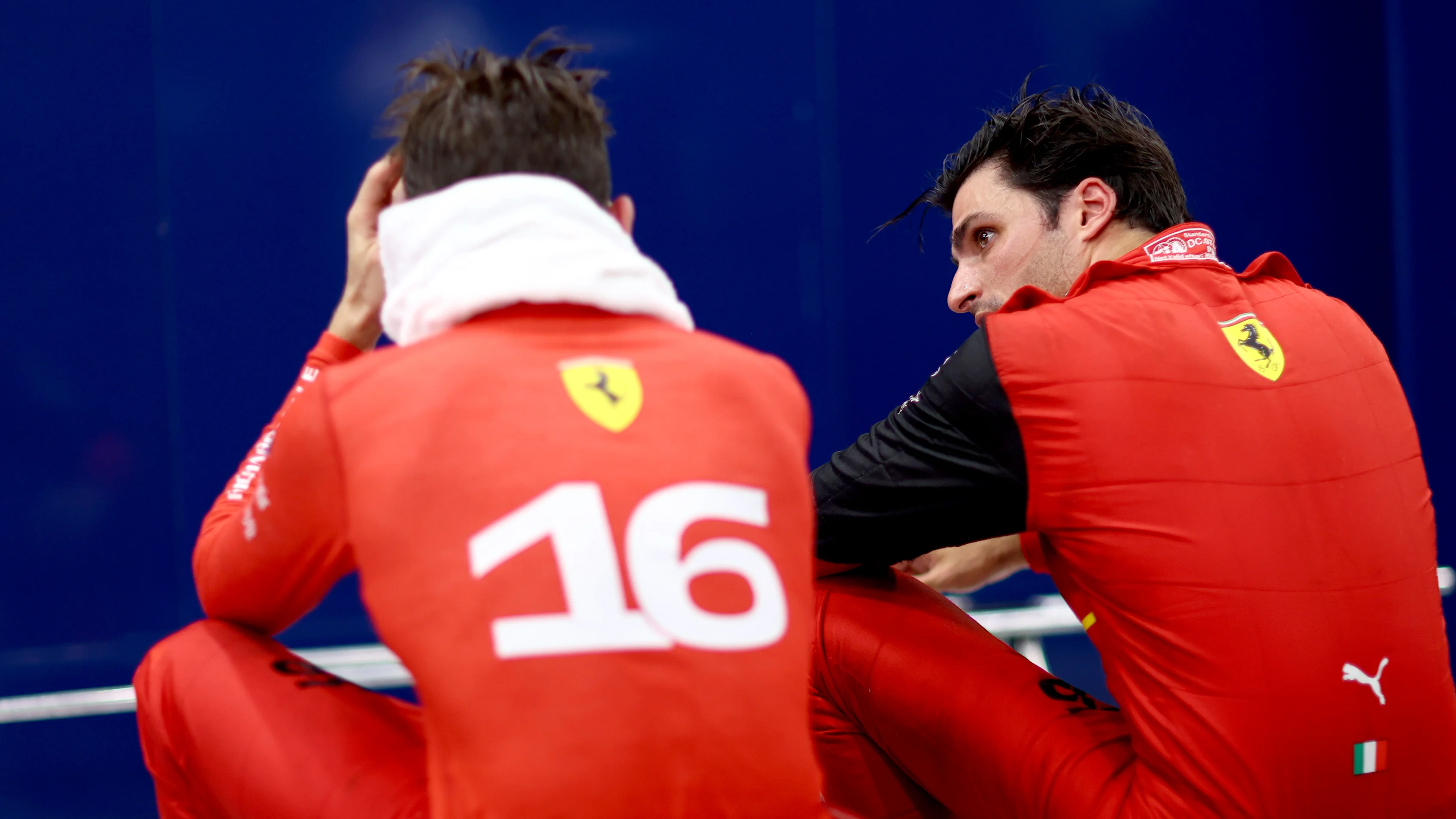 SINGAPORE, SINGAPORE - OCTOBER 02: Third placed Carlos Sainz of Spain and Ferrari and Second placed