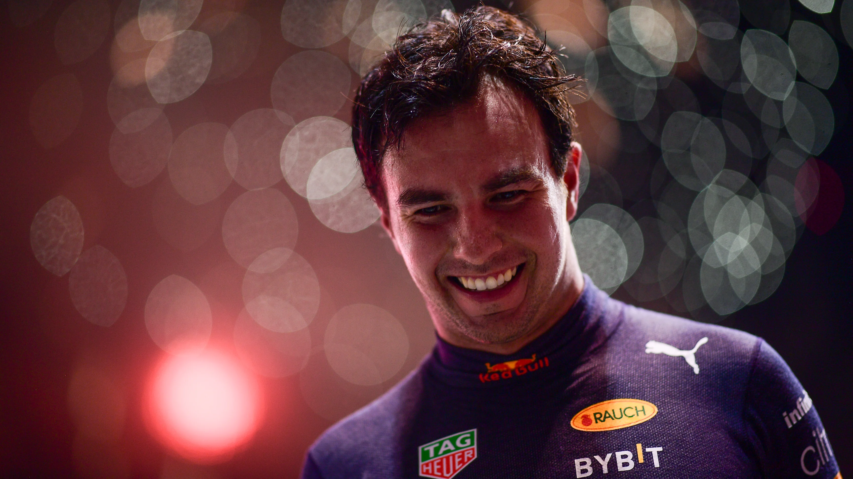 SINGAPORE, SINGAPORE - OCTOBER 02: Race winner Sergio Perez of Mexico and Oracle Red Bull Racing