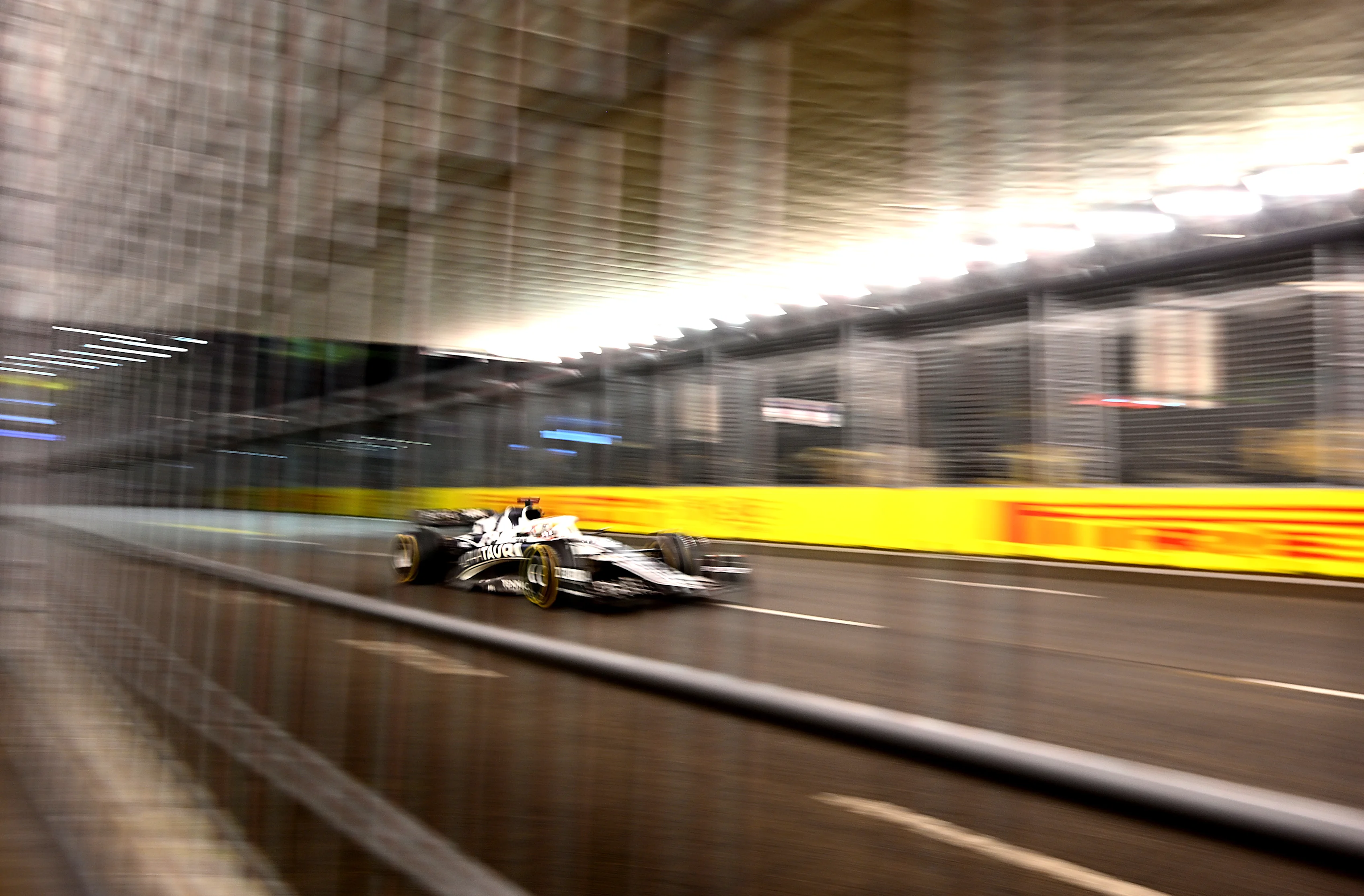 SINGAPORE, SINGAPORE - OCTOBER 02: Pierre Gasly of France driving the (10) Scuderia AlphaTauri AT03