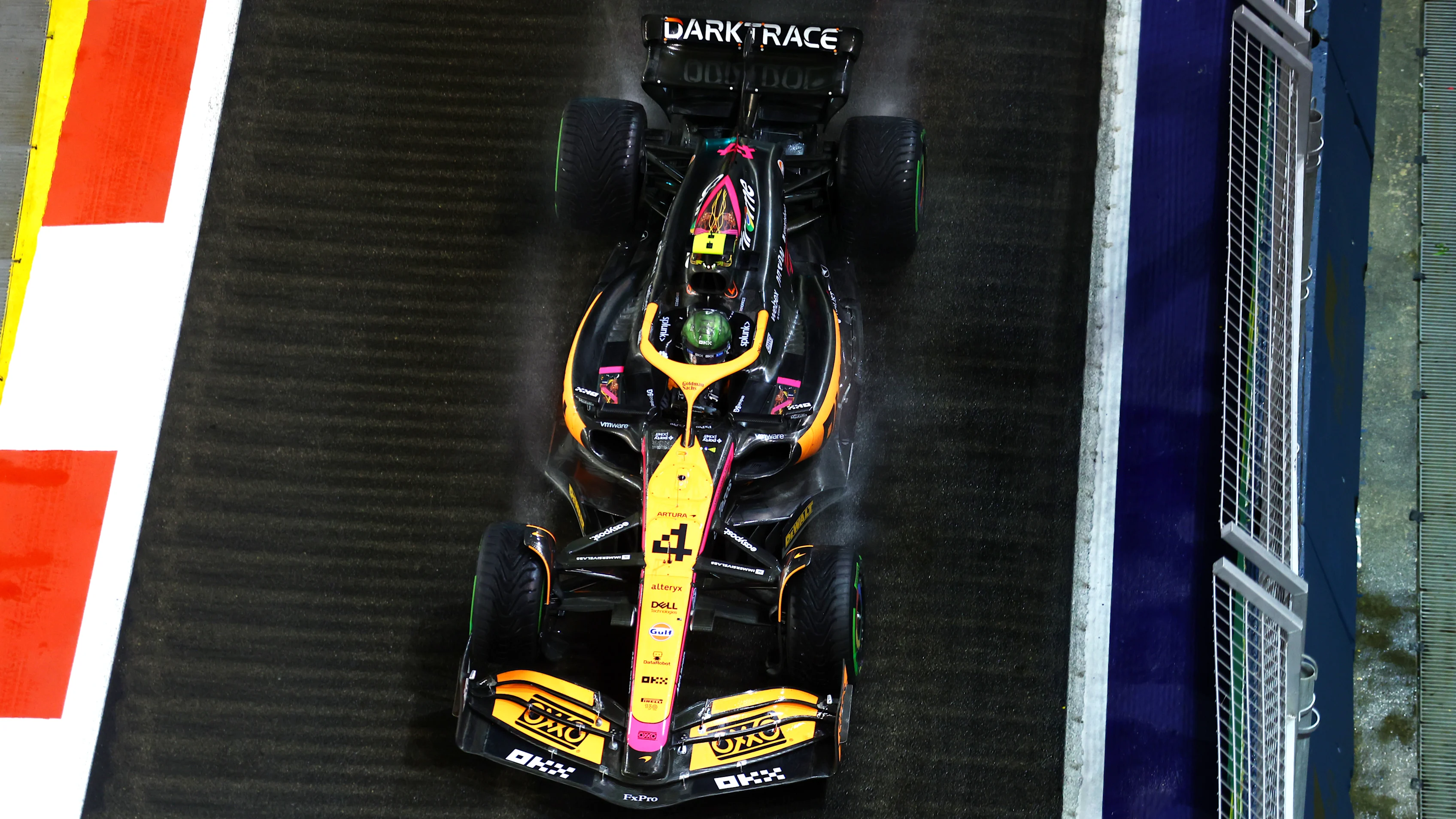 SINGAPORE, SINGAPORE - OCTOBER 02: Lando Norris of Great Britain driving the (4) McLaren MCL36