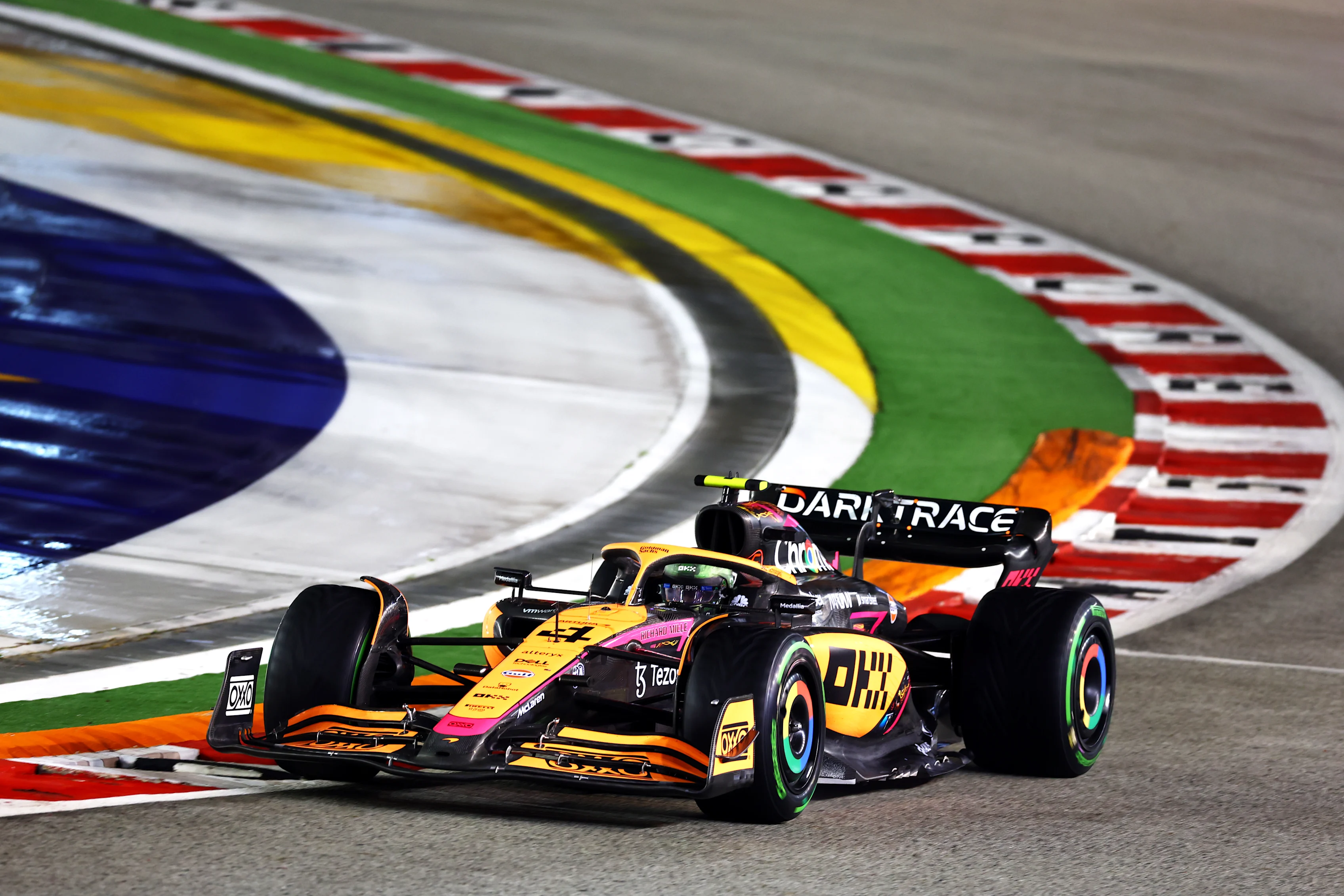 SINGAPORE, SINGAPORE - OCTOBER 02: Lando Norris of Great Britain driving the (4) McLaren MCL36