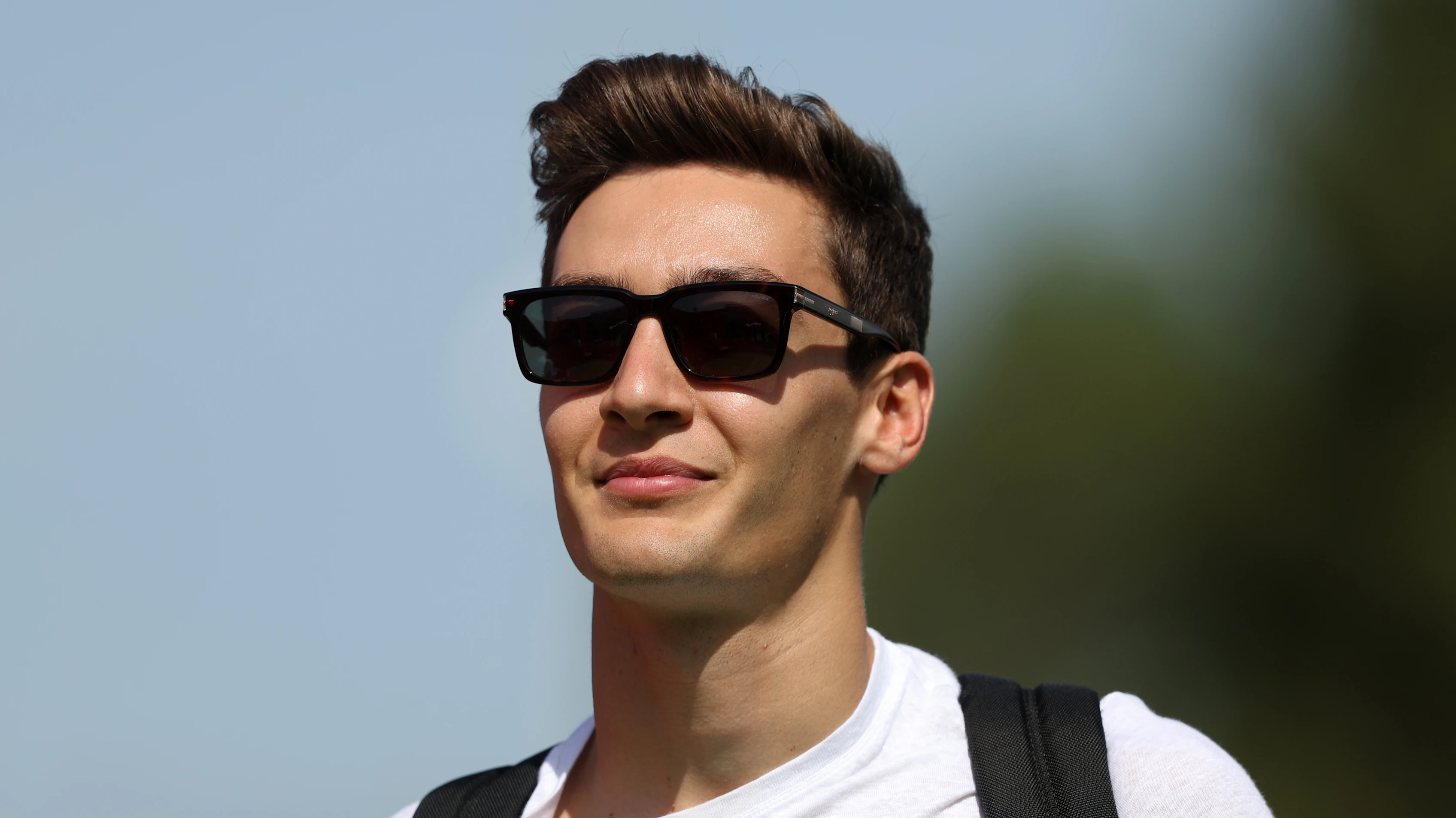 BARCELONA, SPAIN - MAY 20: George Russell of Great Britain and Mercedes walks in the Paddock prior
