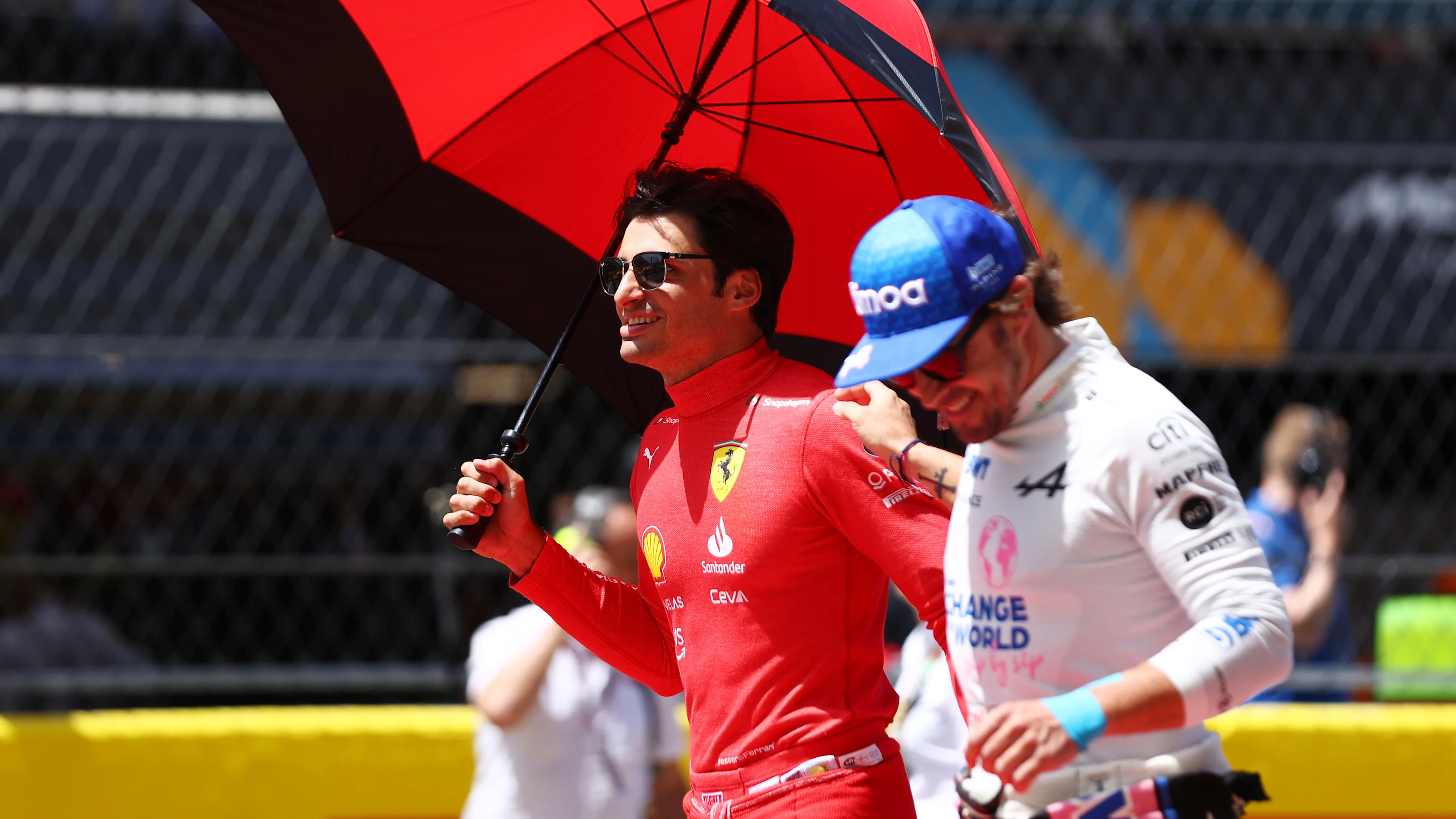 BARCELONA, SPAIN - MAY 22: Carlos Sainz of Spain and Ferrari and Fernando Alonso of Spain and