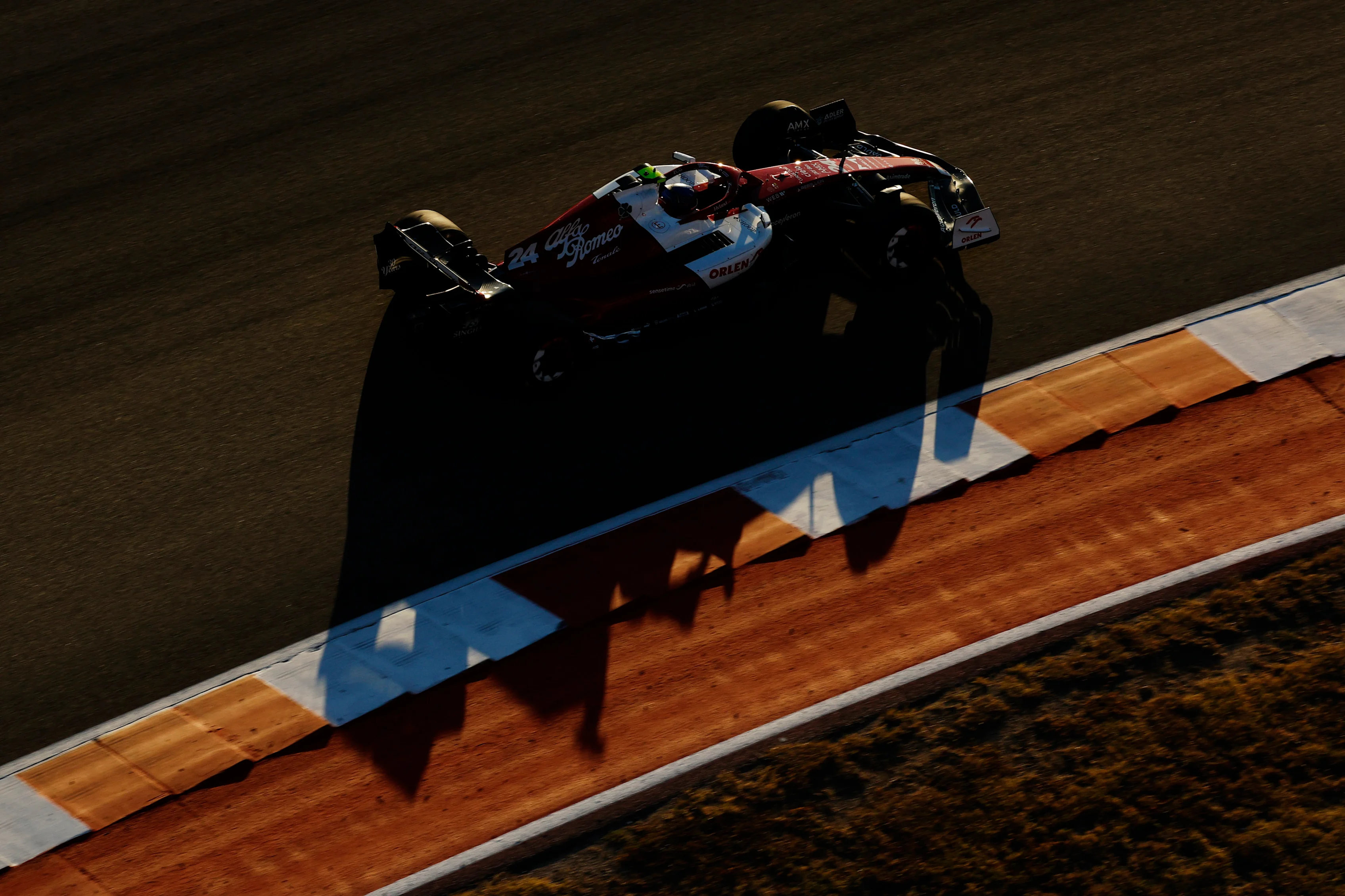 AUSTIN, TEXAS - OCTOBER 21: Zhou Guanyu of China driving the (24) Alfa Romeo F1 C42 Ferrari on
