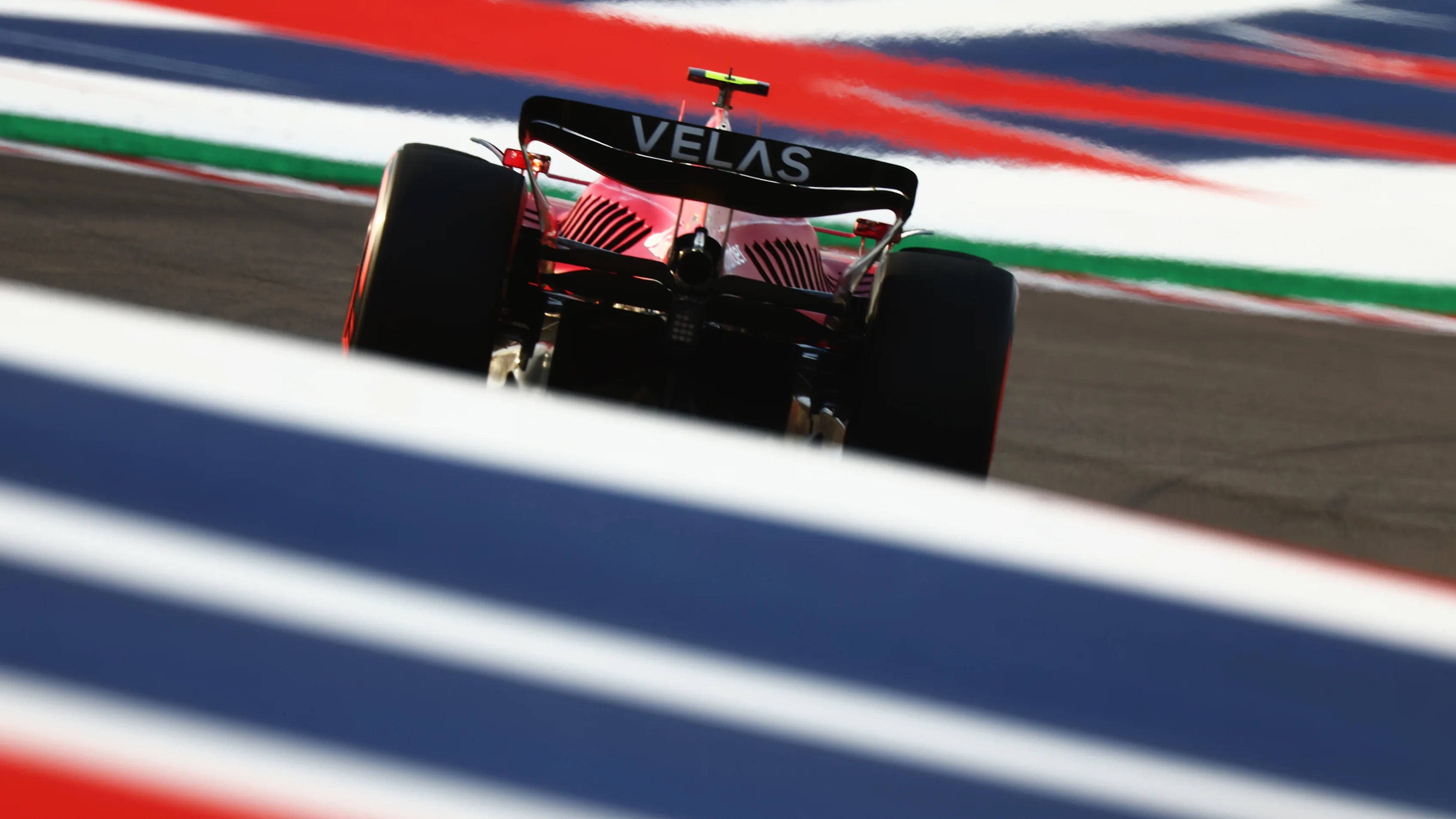 AUSTIN, TEXAS - OCTOBER 22: Carlos Sainz of Spain driving (55) the Ferrari F1-75 on track during