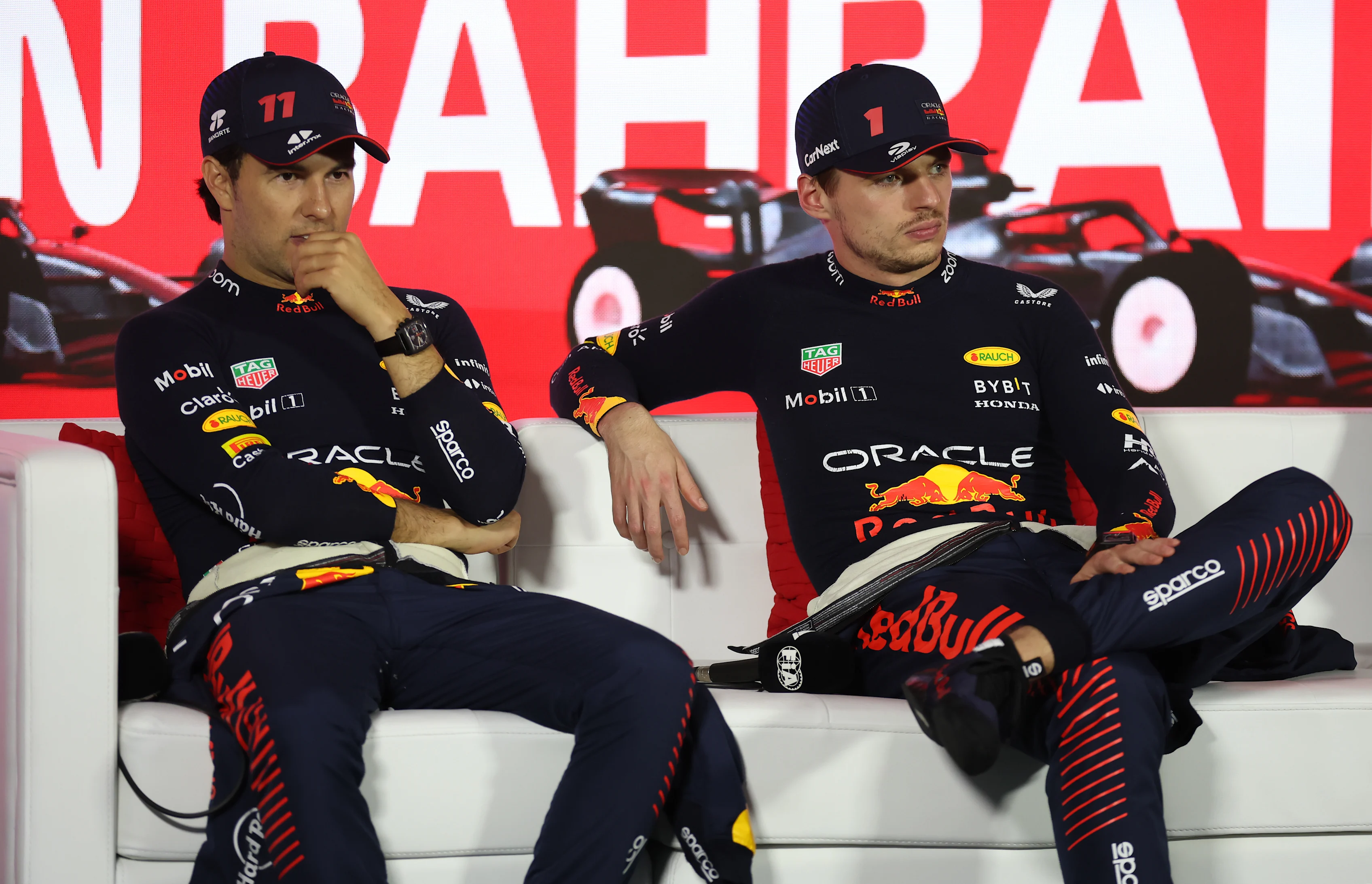 BAHRAIN, BAHRAIN - MARCH 05: Race winner Max Verstappen of the Netherlands and Oracle Red Bull Racing and Second placed Sergio Perez of Mexico and Oracle Red Bull Racing attend the press conference after the F1 Grand Prix of Bahrain at Bahrain International Circuit on March 05, 2023 in Bahrain, Bahrain. (Photo by Lars Baron/Getty Images)