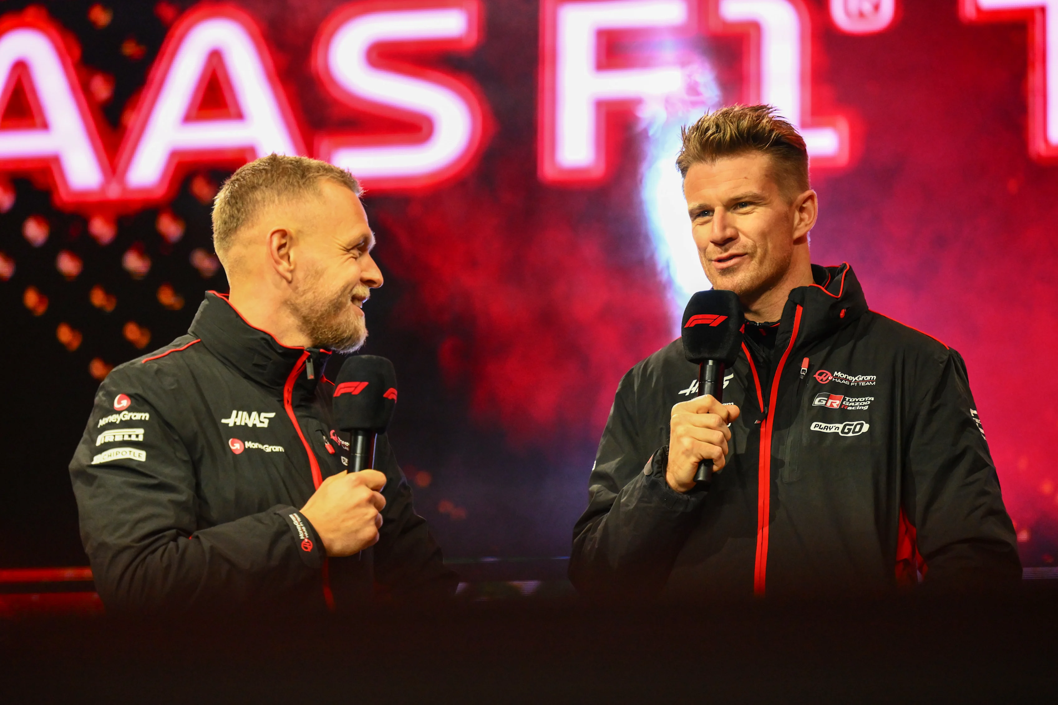 UNITED STATES OF AMERICA - NOVEMBER 22: Kevin Magnussen, Haas F1 Team, and Nico Hulkenberg, Haas F1 Team, on stage during the Las Vegas GP at Streets of Las Vegas on Friday November 22, 2024, United States of America. (Photo by Simon Galloway / LAT Images)
