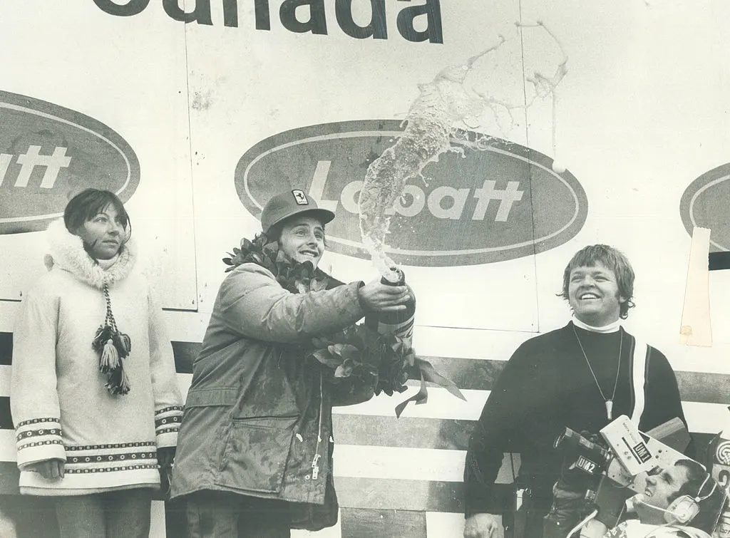 CANADA - OCTOBER 08: Beer flows like champagne as Gilles Villeneuve uncorks his jubilation at
