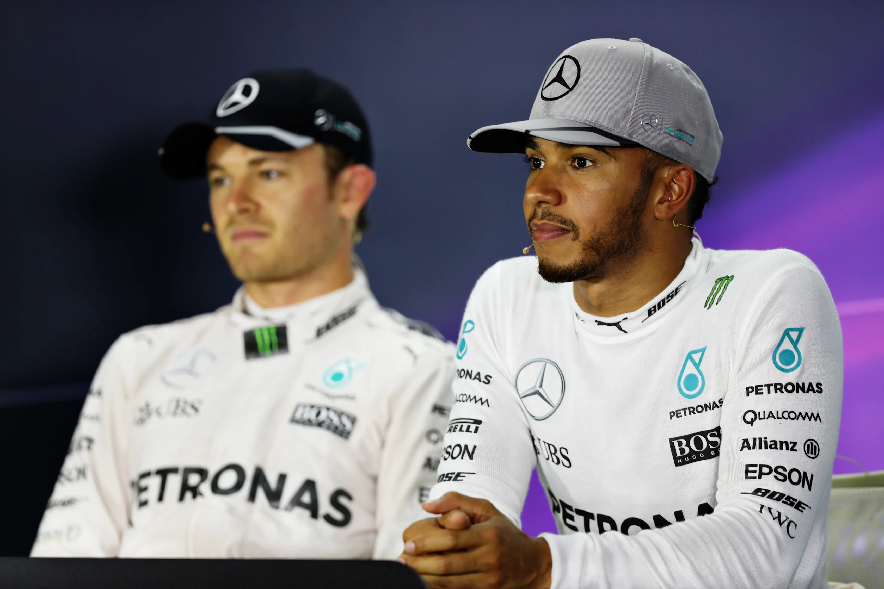 SINGAPORE - SEPTEMBER 17: Lewis Hamilton of Great Britain and Mercedes GP and Nico Rosberg of