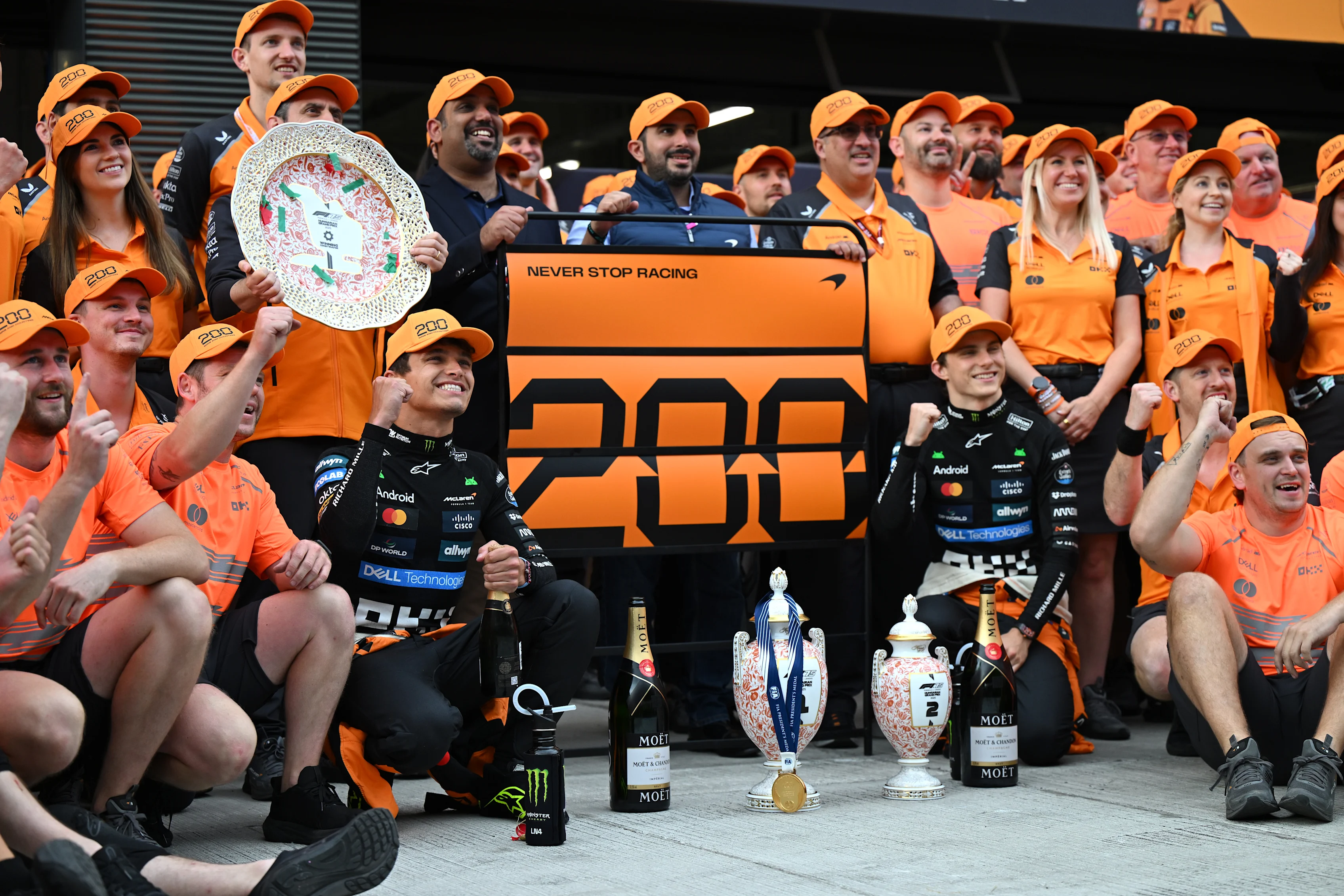 BUDAPEST, HUNGARY - AUGUST 03: Race winner Lando Norris of Great Britain and McLaren Second placed