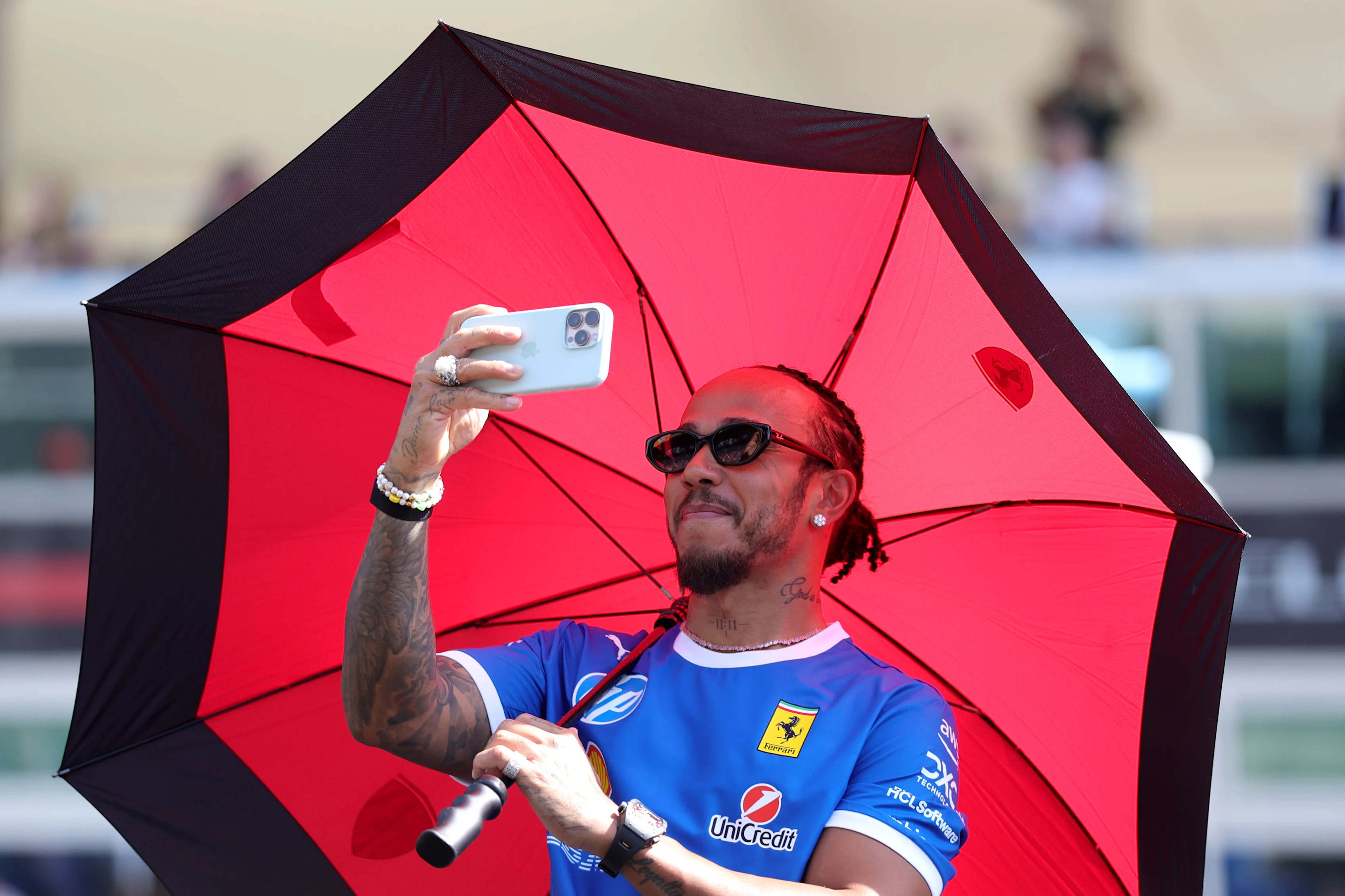 MONZA, ITALY - SEPTEMBER 07: Lewis Hamilton of Great Britain and Scuderia Ferrari takes a photo on