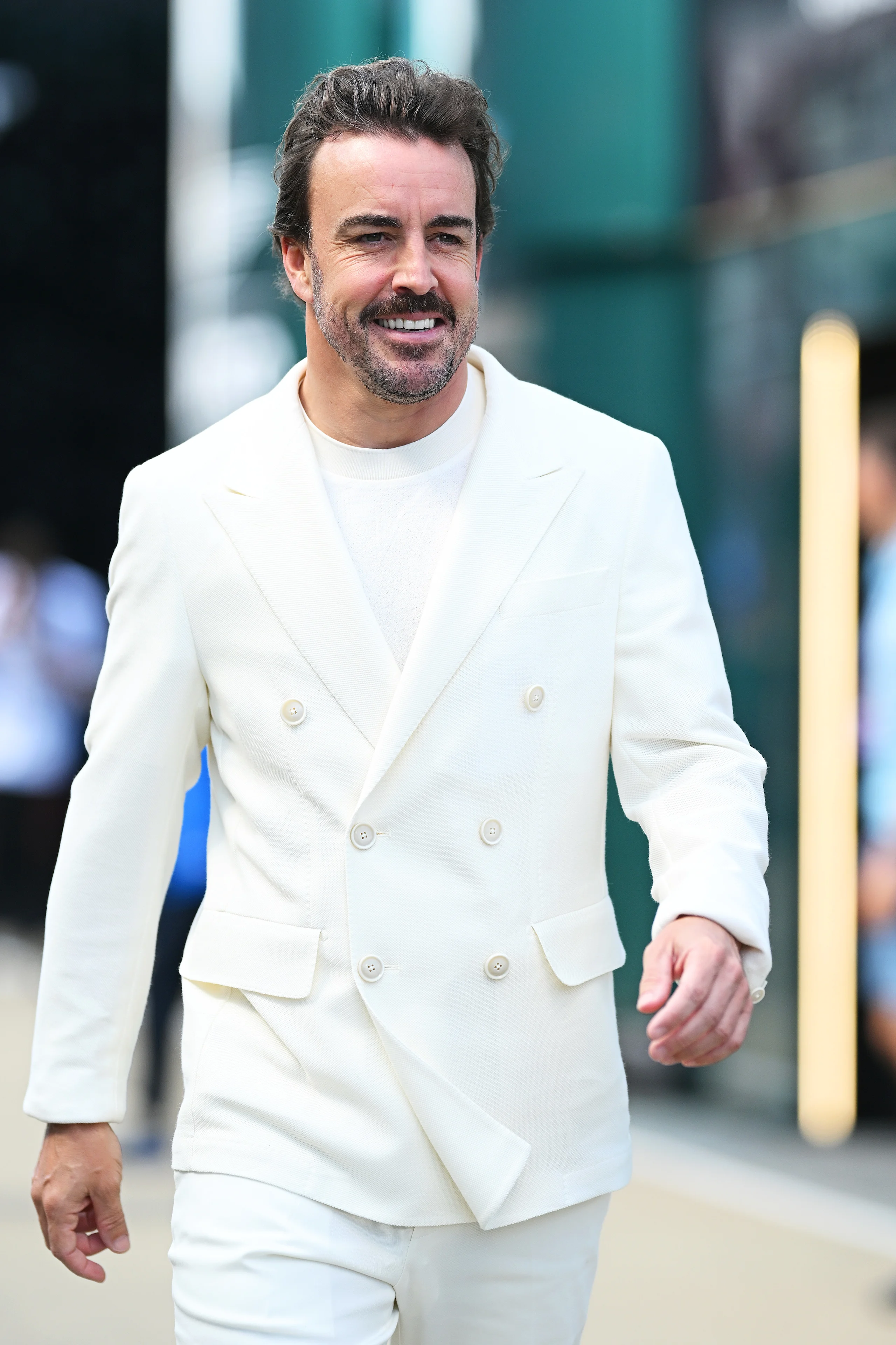 NORTHAMPTON, ENGLAND - JULY 03: Fernando Alonso of Spain and Aston Martin F1 Team arrives in the