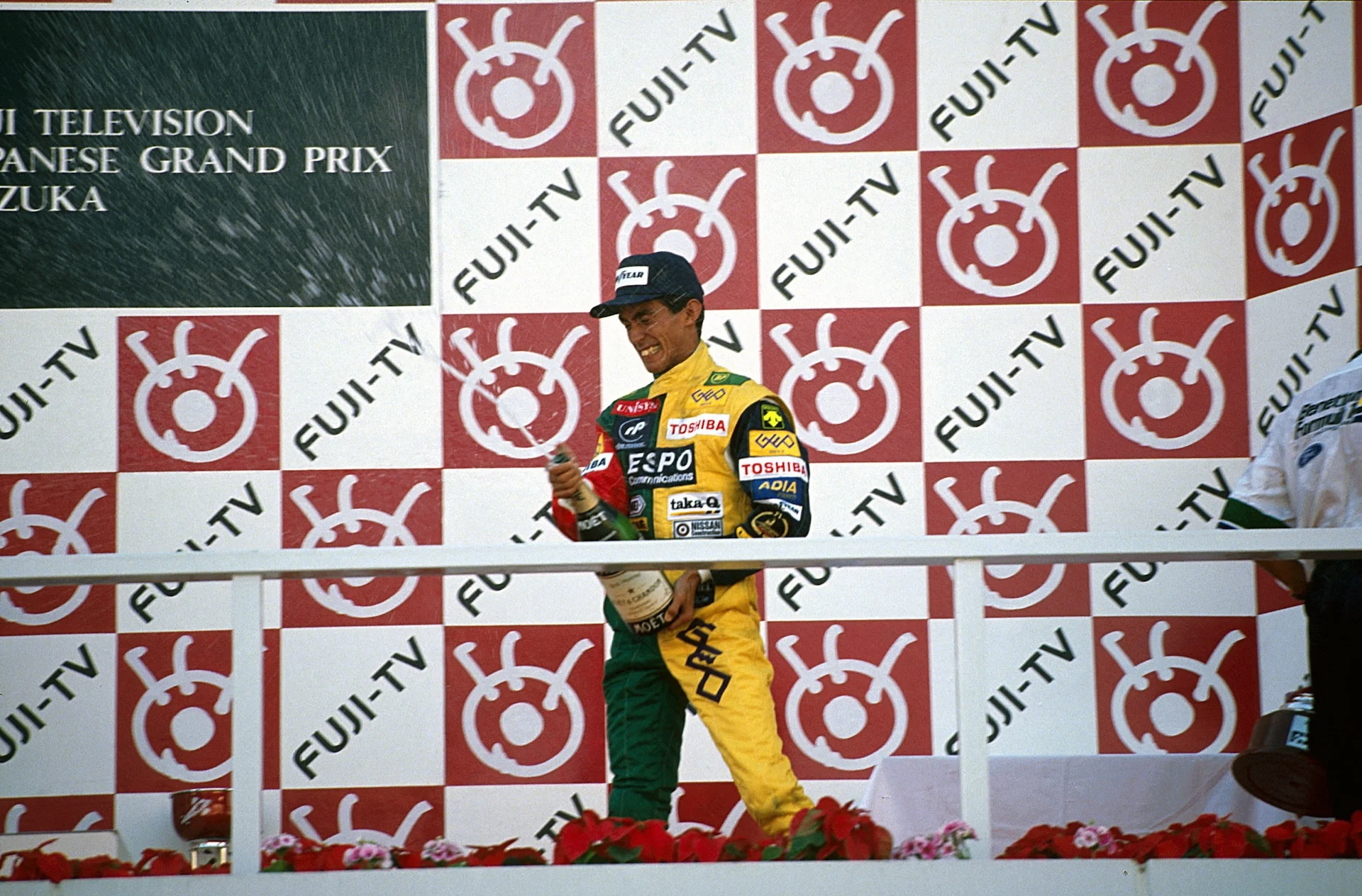 Aguri Suzuki (JPN) Larrousse celebrates the first ever podium for a Japanese driver in Formula