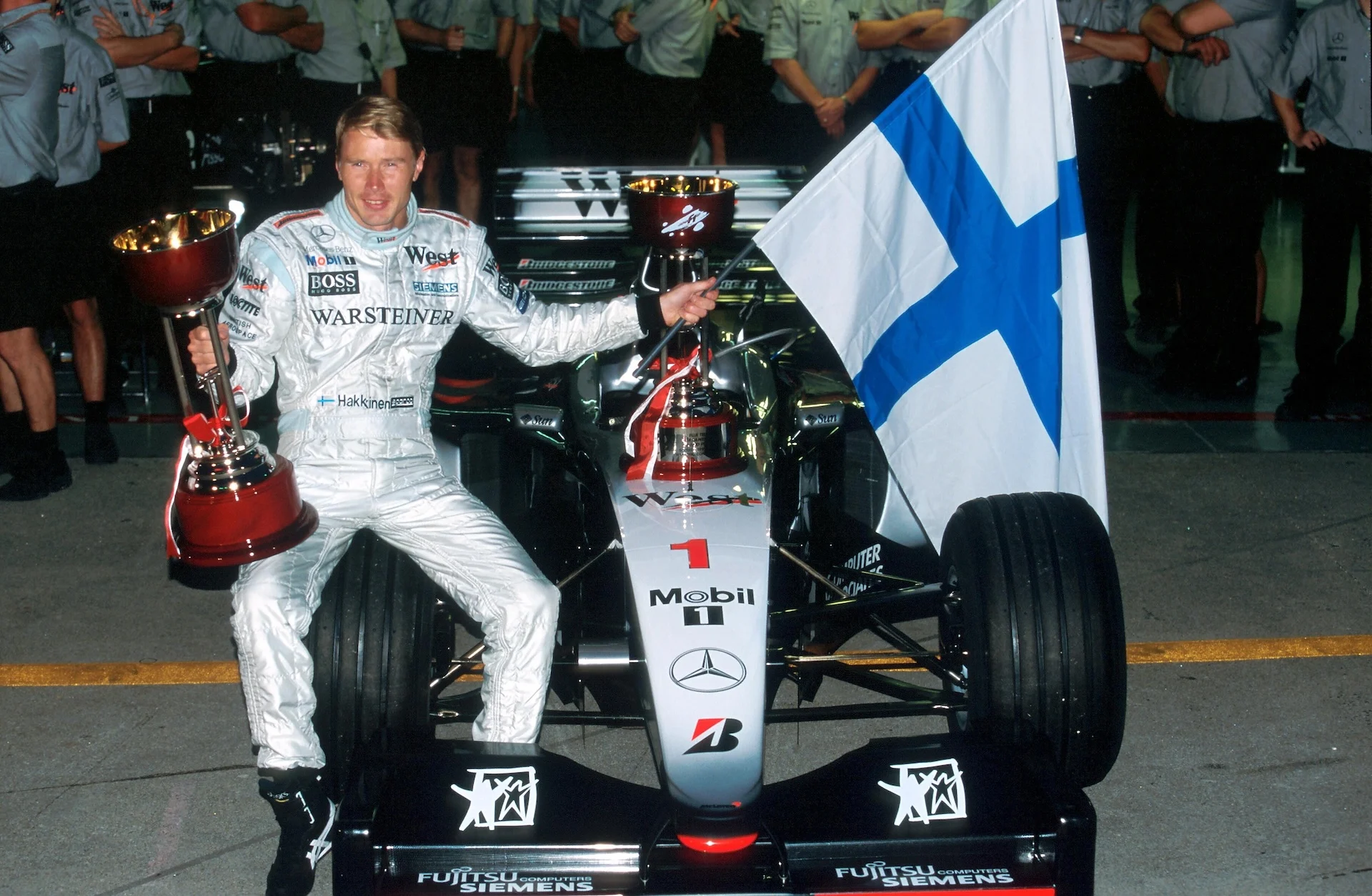 Mika Hakkinen(FIN) Mclaren MP4-14 race winner and World Champion for the second year running