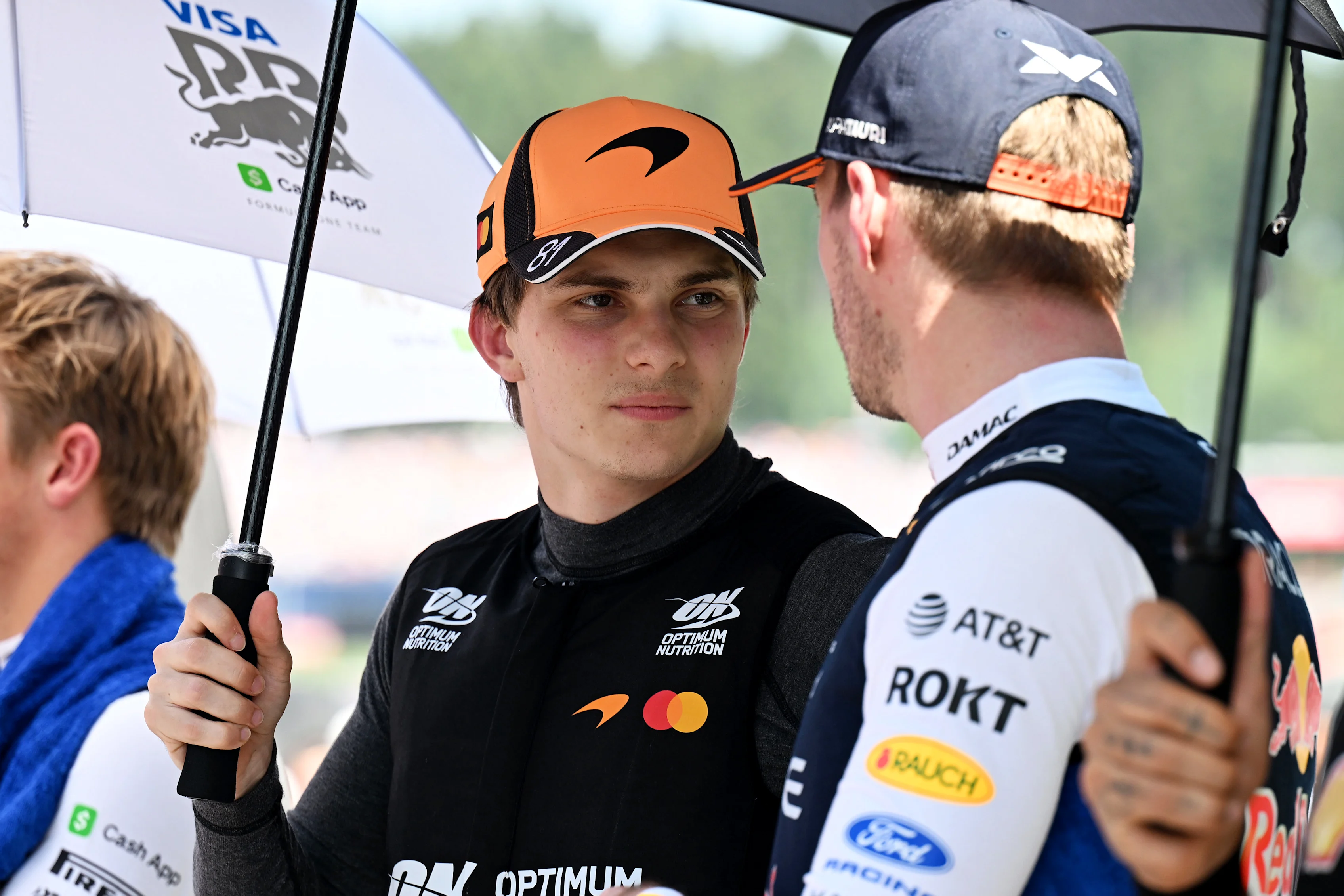 SPIELBERG, AUSTRIA - JUNE 28: Oscar Piastri of Australia and McLaren and Max Verstappen of the