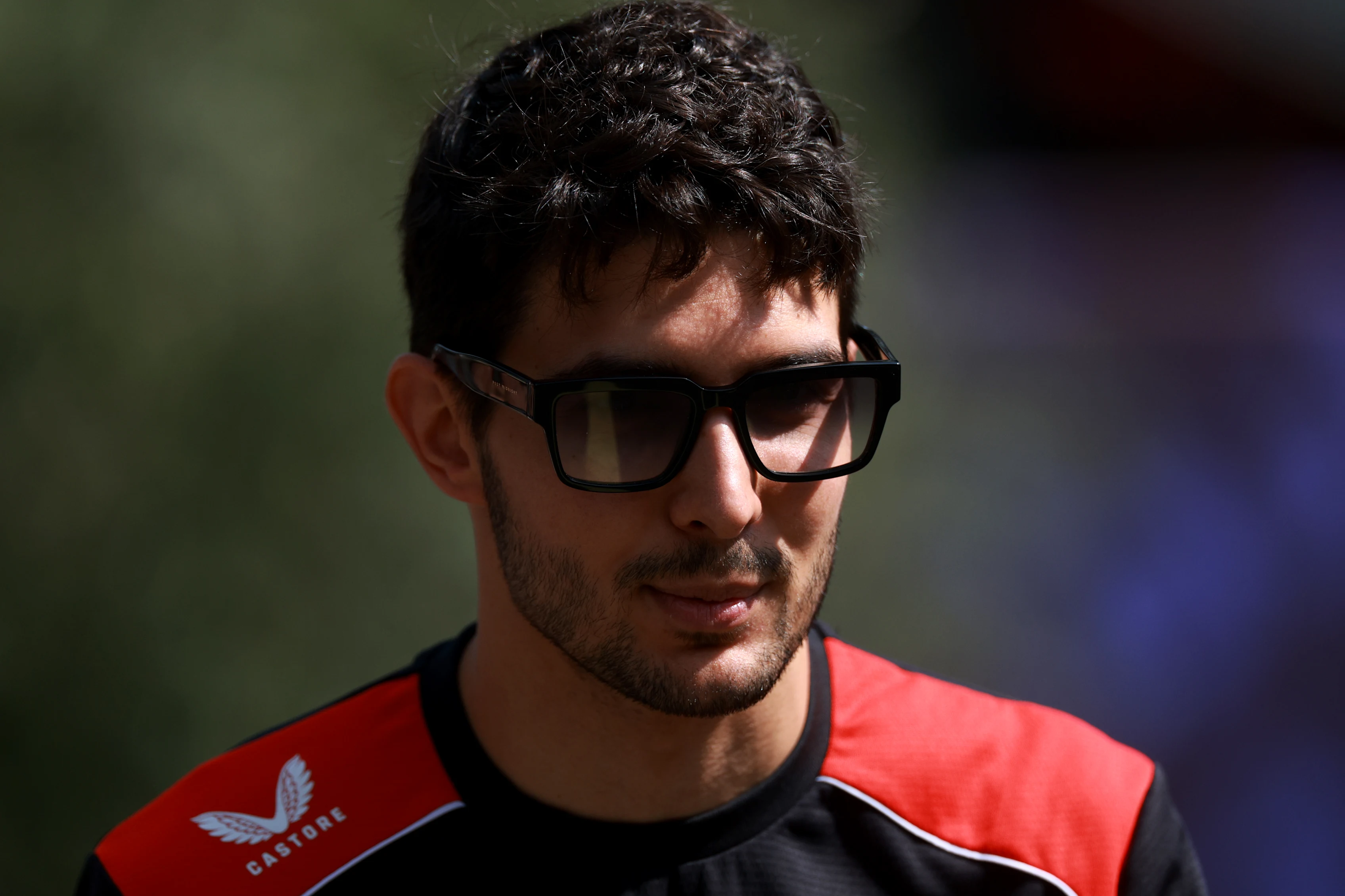 BAKU, AZERBAIJAN - SEPTEMBER 23: Esteban Ocon of France and Haas F1 walks in the Paddock during