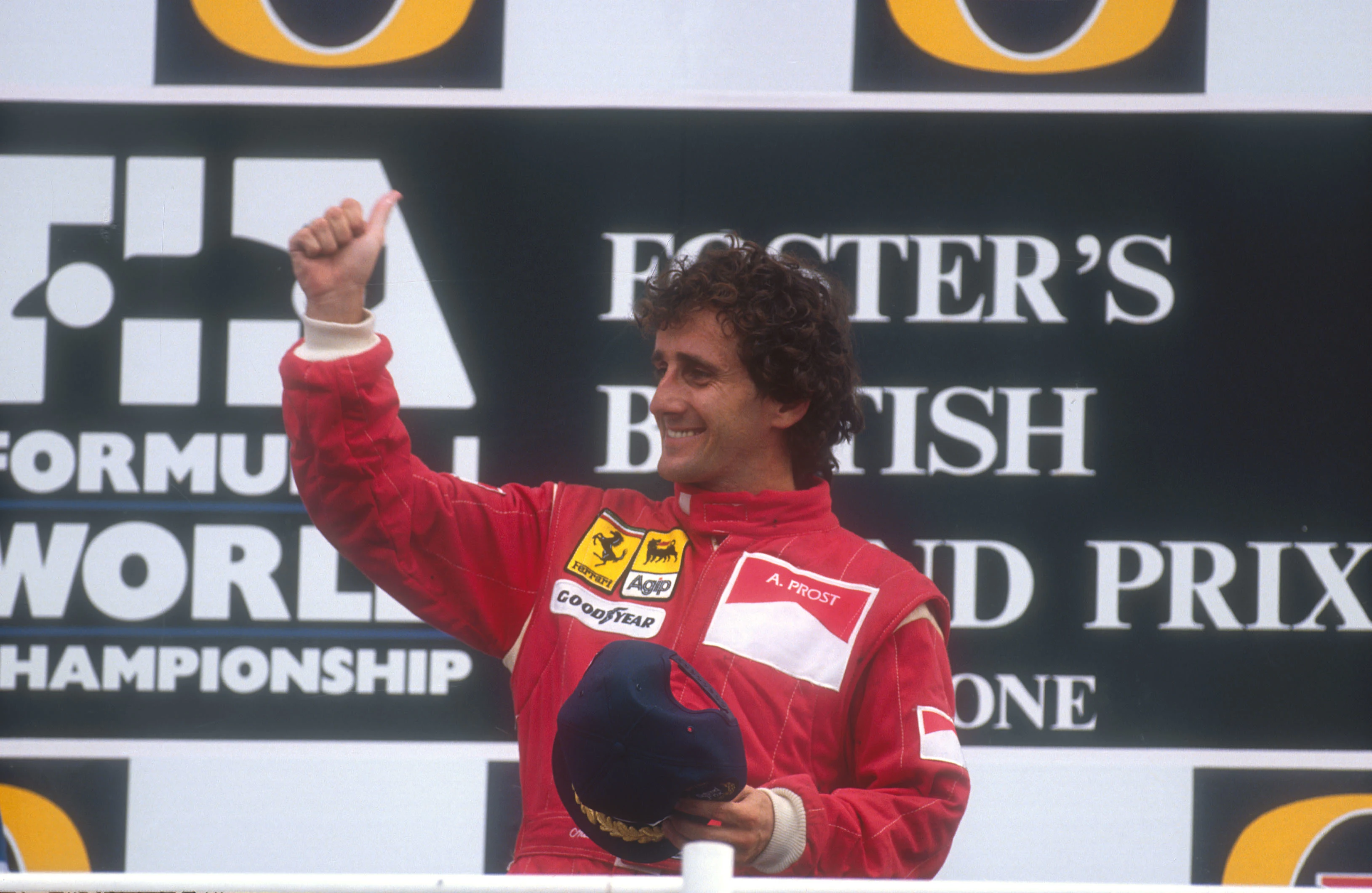1990 British Grand Prix. Silverstone, England. 13-15 July 1990. Alain Prost (Ferrari) celebrates