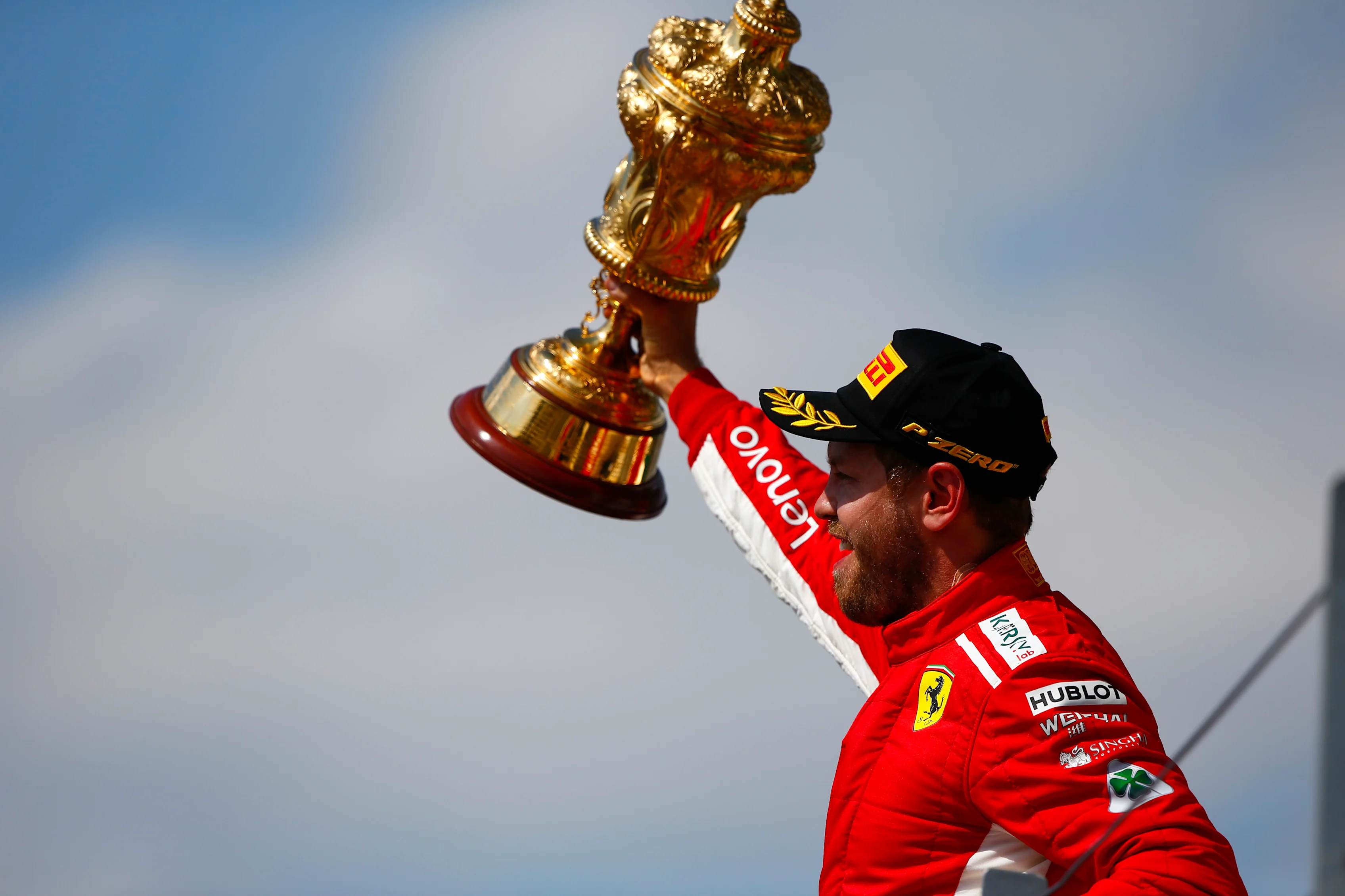 SILVERSTONE, UNITED KINGDOM - JULY 08: Sebastian Vettel, Ferrari, celebrates victory on the podium,