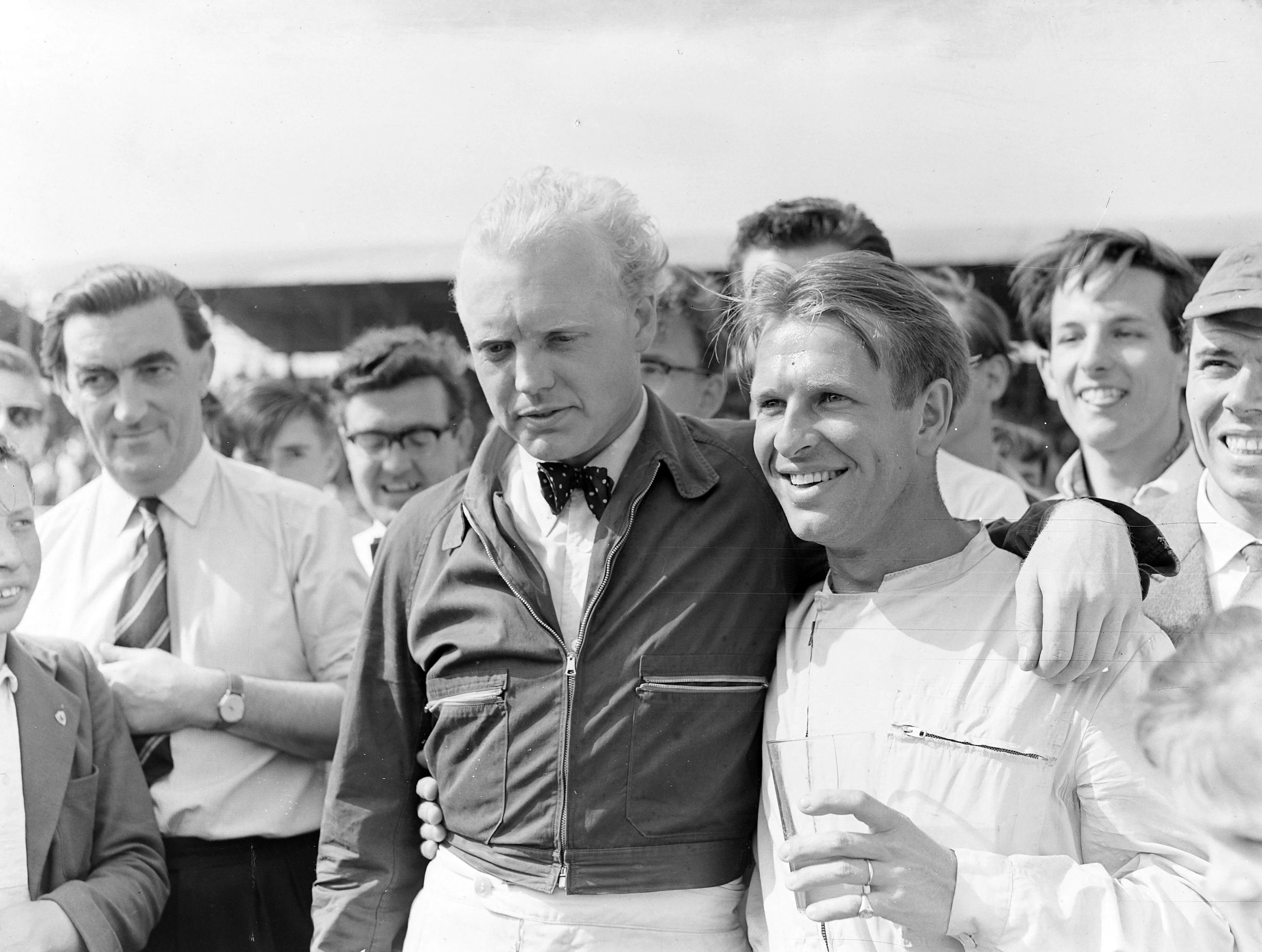 SILVERSTONE CIRCUIT, UNITED KINGDOM - JULY 19: Mike Hawthorn, 2nd position, congratulates team-mate