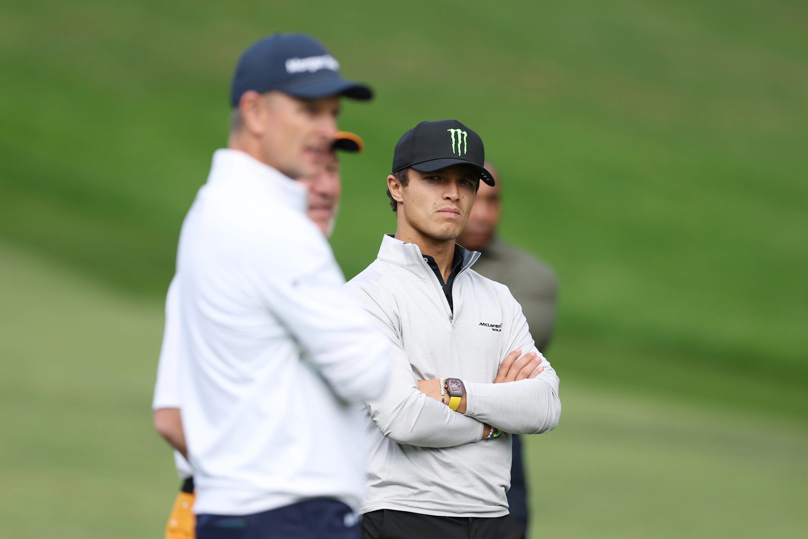 VIRGINIA WATER, ENGLAND - SEPTEMBER 16: Lando Norris looks on during the Pro-Am prior to the BMW