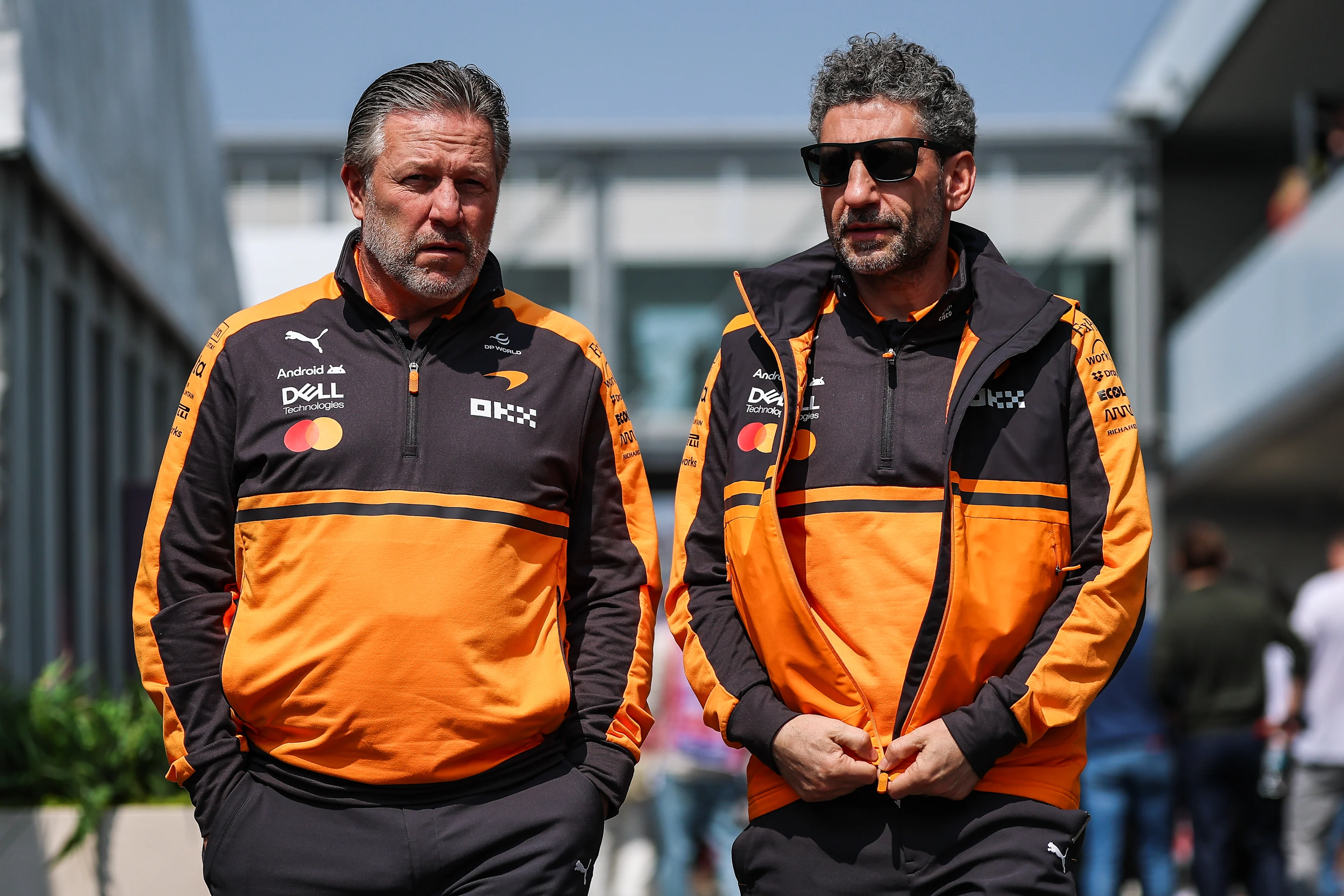 SUZUKA, JAPAN - MARCH 28: (L-R) McLaren CEO Zak Brown and McLaren Team Principal Andrea Stella walk