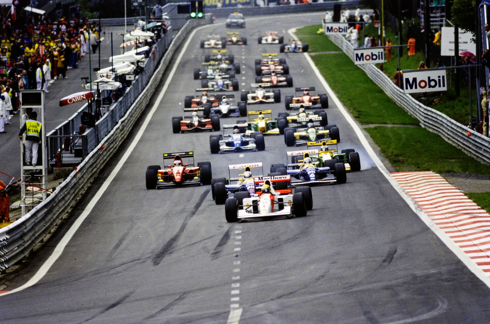 SPA-FRANCORCHAMPS, BELGIUM - AUGUST 30: Ayrton Senna, McLaren MP4-7A Honda, leads Nigel Mansell,