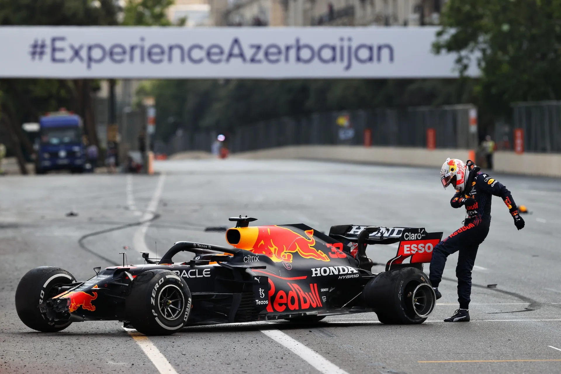 BAKU, AZERBAIJAN - JUNE 06:Max Verstappen of Netherlands and Red Bull Racing kicks his tyre as he