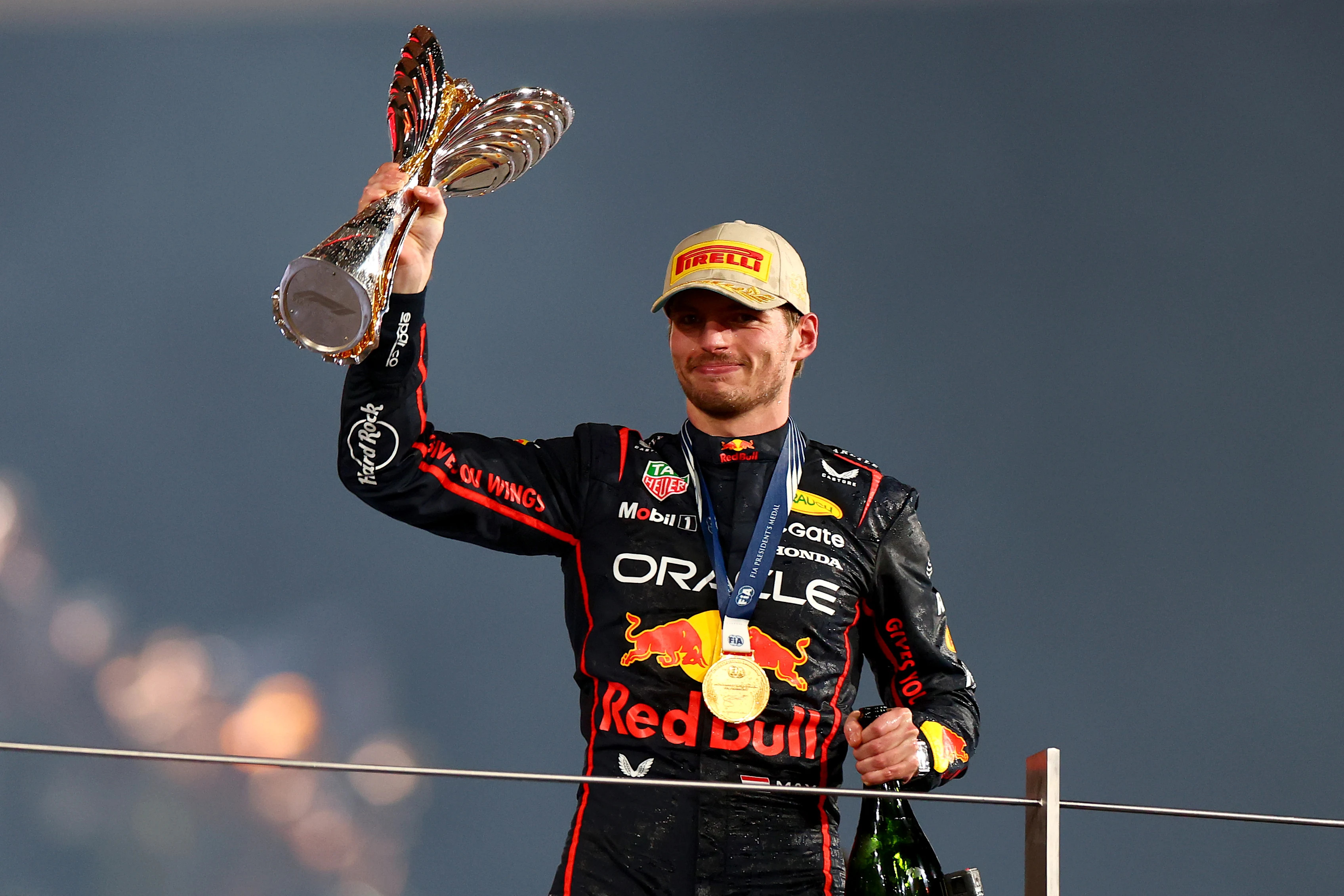 ABU DHABI, UNITED ARAB EMIRATES - DECEMBER 07: Race winner Max Verstappen of the Netherlands and