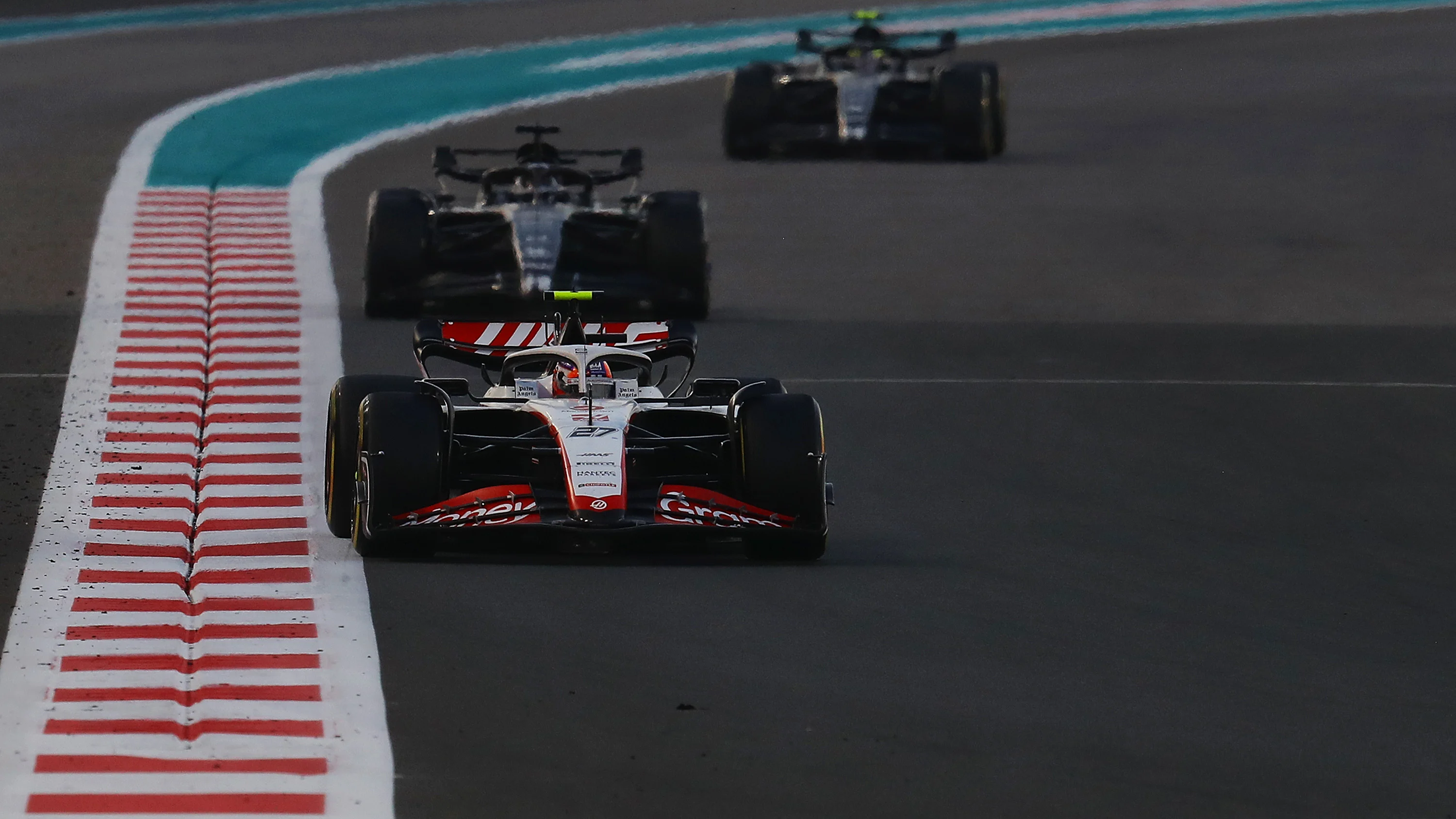 ABU DHABI, UNITED ARAB EMIRATES - NOVEMBER 26: Nico Hulkenberg of Germany driving the (27) Haas F1 VF-23 Ferrari on track during the F1 Grand Prix of Abu Dhabi at Yas Marina Circuit on November 26, 2023 in Abu Dhabi, United Arab Emirates. (Photo by Joe Portlock - Formula 1/Formula 1 via Getty Images)