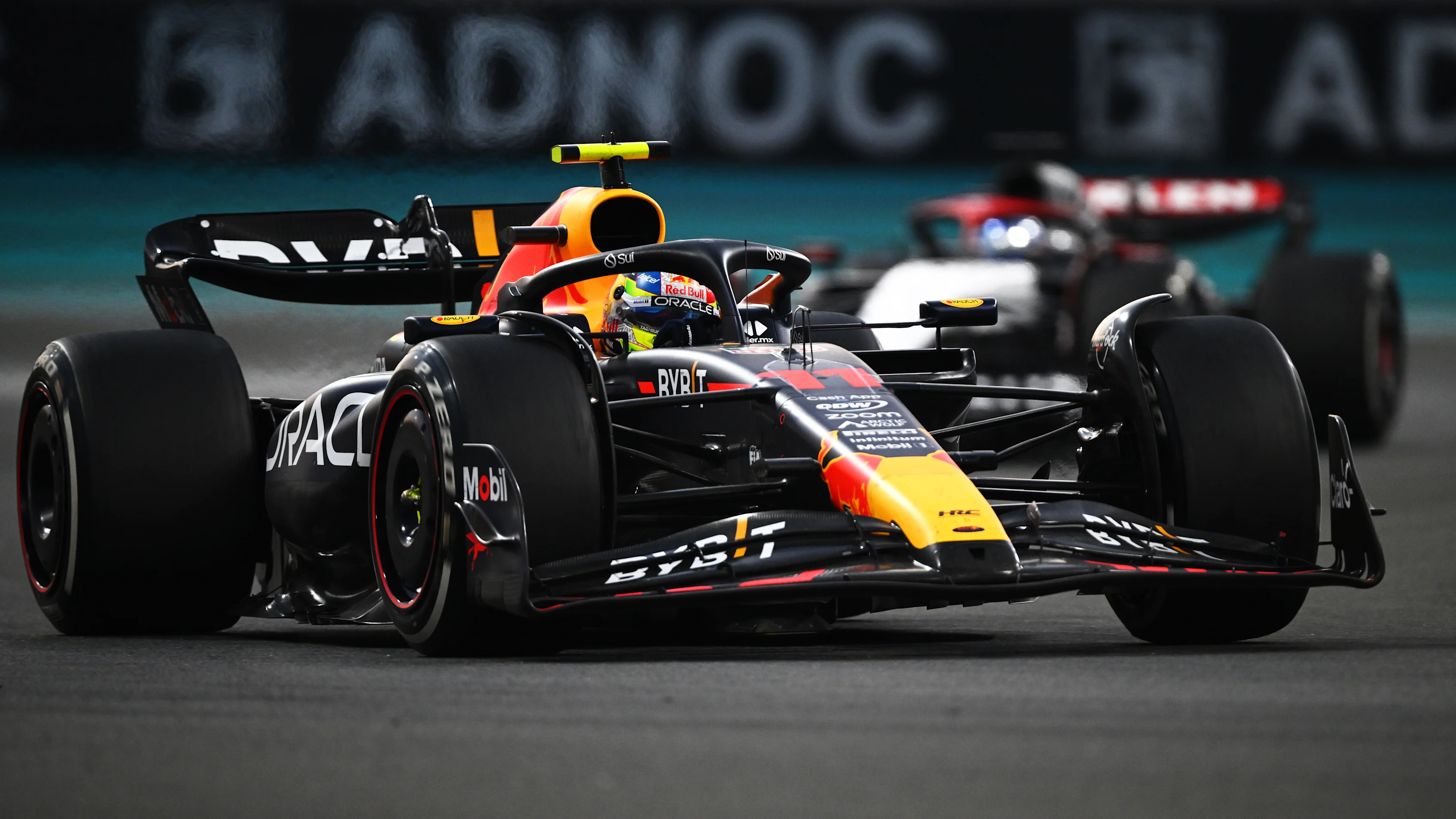 ABU DHABI, UNITED ARAB EMIRATES - NOVEMBER 26: Sergio Perez of Mexico driving the (11) Oracle Red