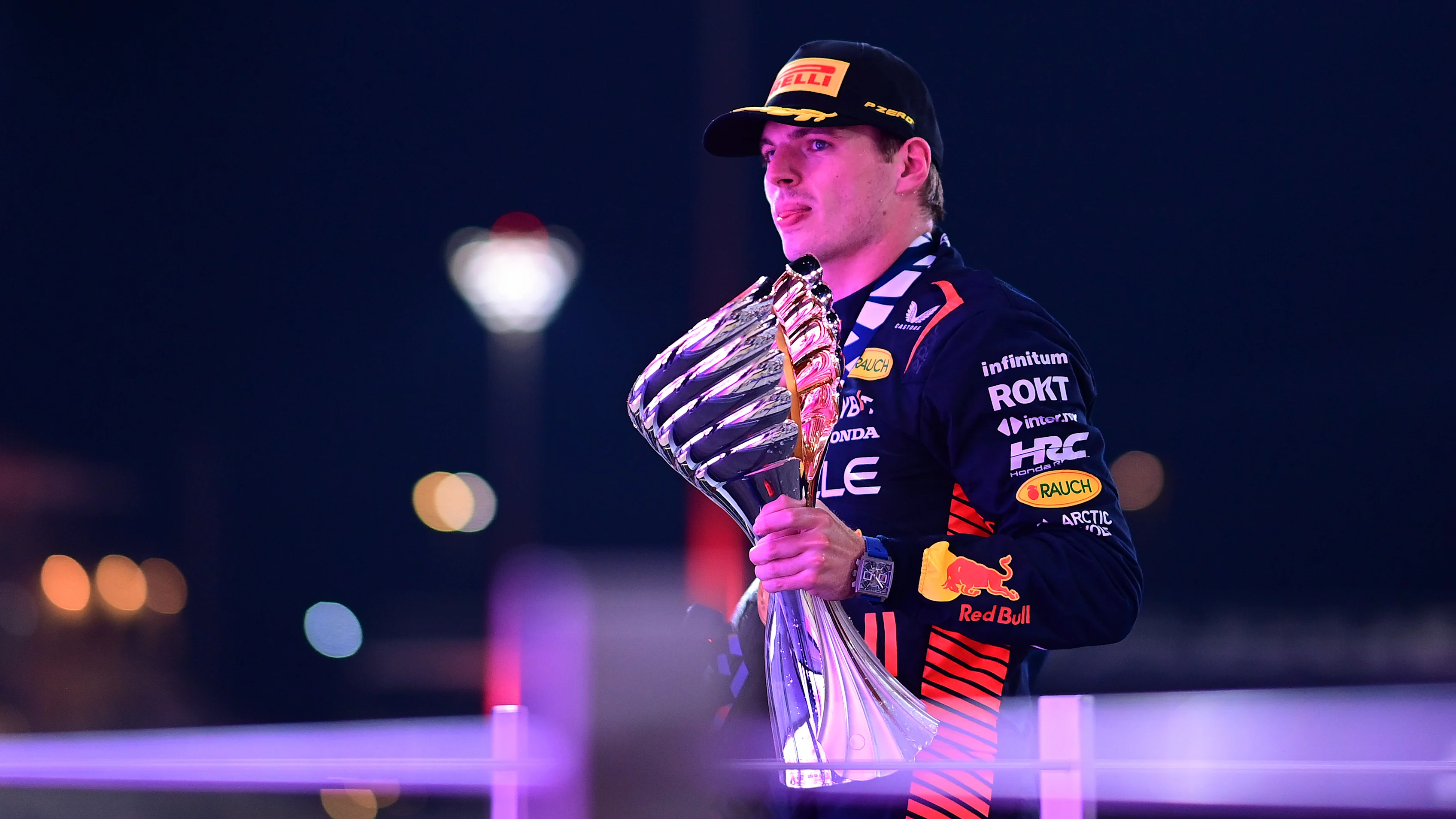 ABU DHABI, UNITED ARAB EMIRATES - NOVEMBER 26: Race winner Max Verstappen of the Netherlands and Oracle Red Bull Racing celebrates on the podium during the F1 Grand Prix of Abu Dhabi at Yas Marina Circuit on November 26, 2023 in Abu Dhabi, United Arab Emirates. (Photo by Mario Renzi - Formula 1/Formula 1 via Getty Images)