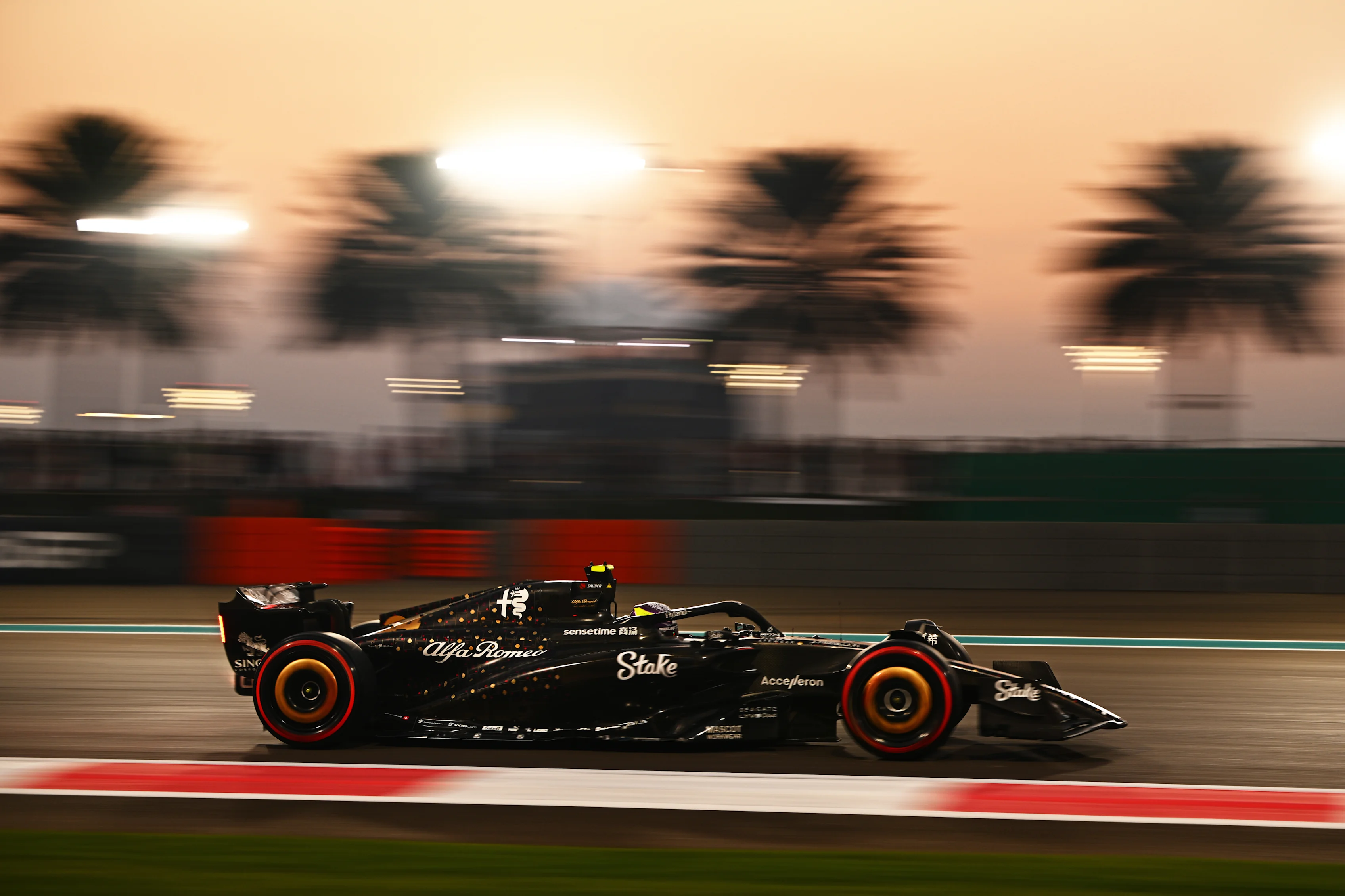 ABU DHABI, UNITED ARAB EMIRATES - NOVEMBER 24: Zhou Guanyu of China driving the (24) Alfa Romeo F1