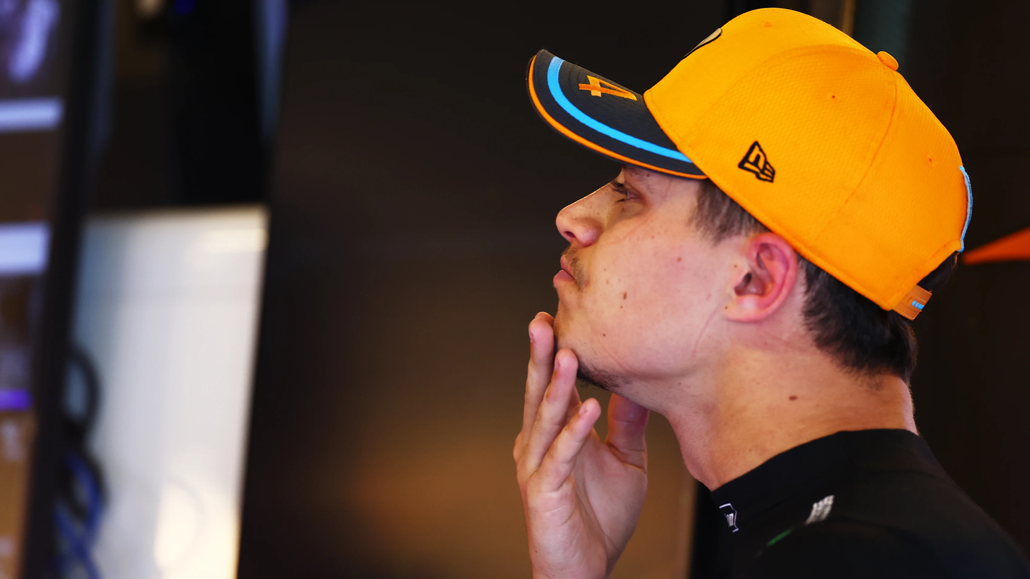 ABU DHABI, UNITED ARAB EMIRATES - NOVEMBER 25: Lando Norris of Great Britain and McLaren looks on