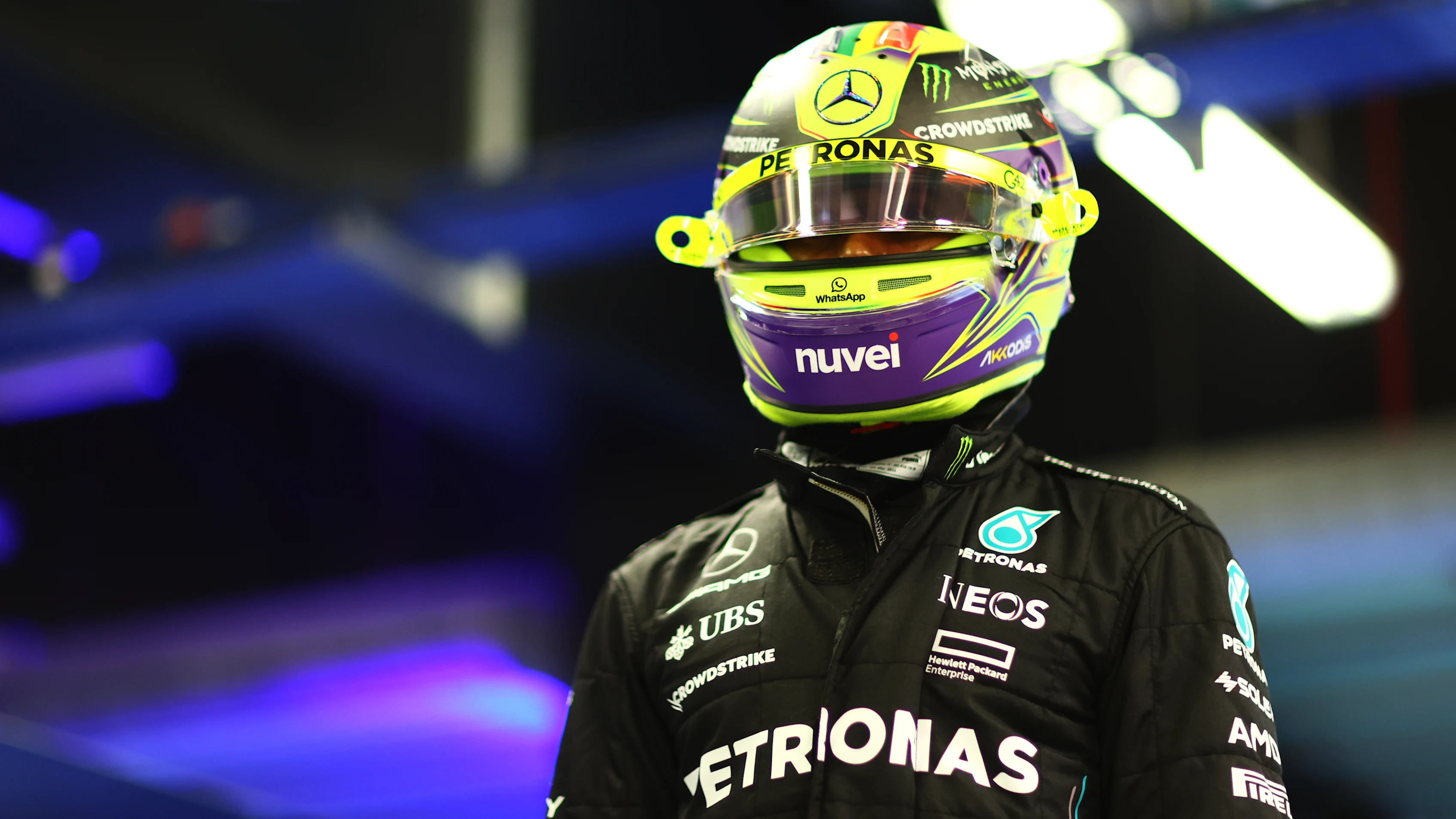 ABU DHABI, UNITED ARAB EMIRATES - NOVEMBER 25: 11th placed qualifier Lewis Hamilton of Great