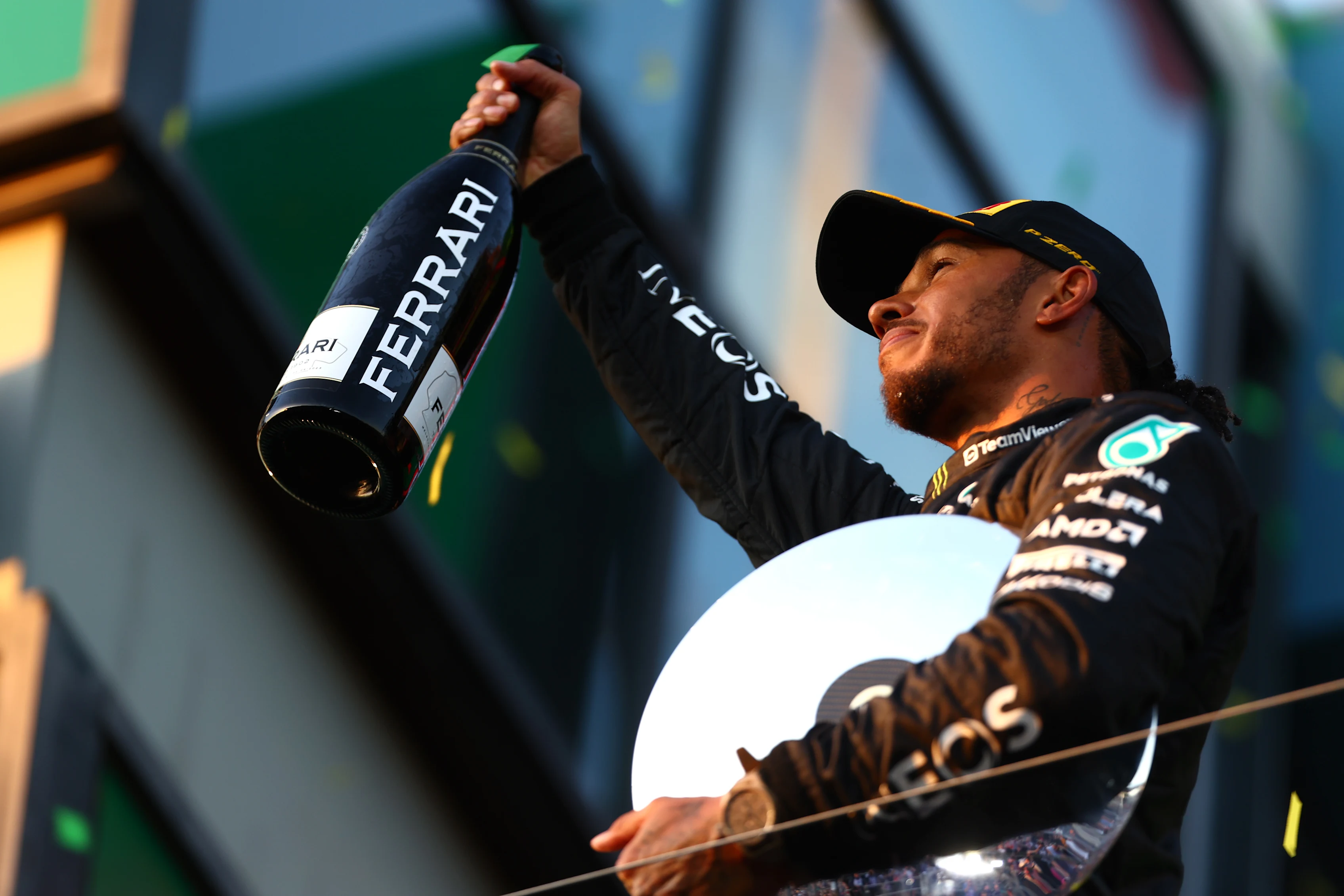 MELBOURNE, AUSTRALIA - APRIL 02: Second placed Lewis Hamilton of Great Britain and Mercedes celebrates on the podium during the F1 Grand Prix of Australia at Albert Park Grand Prix Circuit on April 02, 2023 in Melbourne, Australia. (Photo by Dan Istitene - Formula 1/Formula 1 via Getty Images)