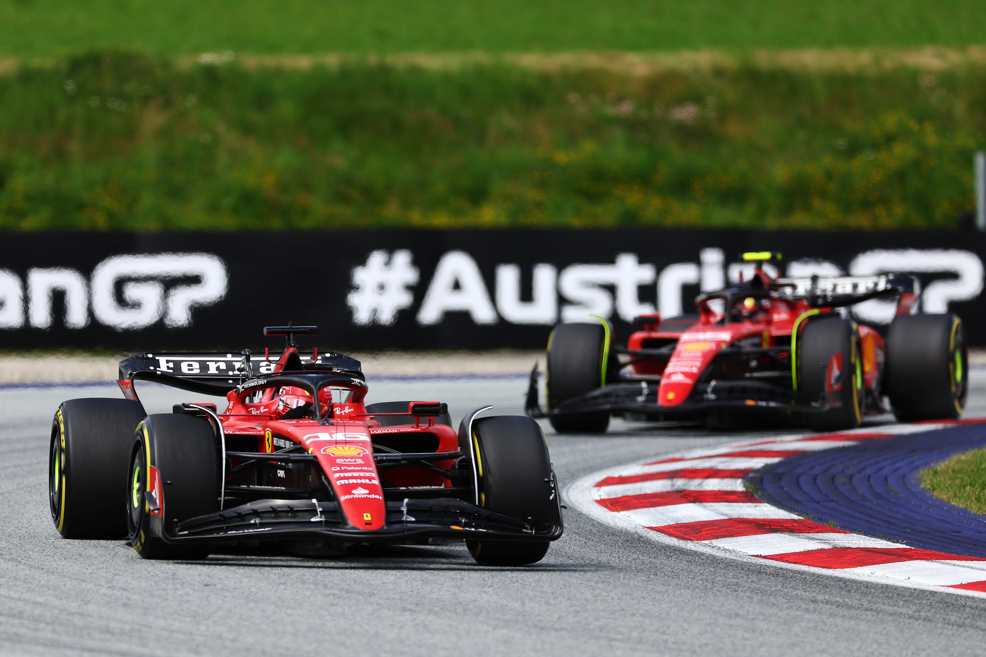 SPIELBERG, AUSTRIA - JULY 02: Charles Leclerc of Monaco driving the (16) Ferrari SF-23 leads Carlos