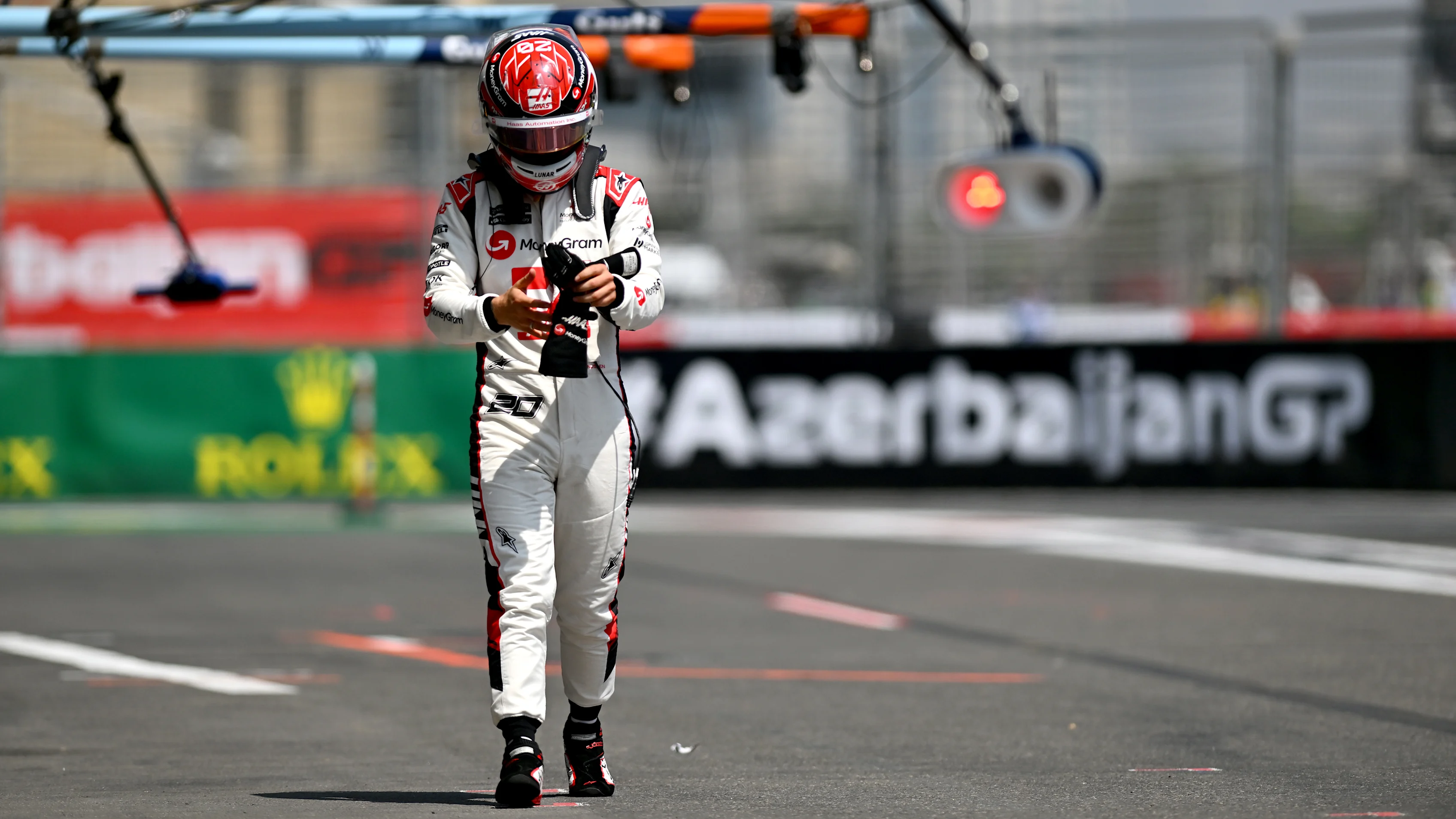 BAKU, AZERBAIJAN - APRIL 28: Kevin Magnussen of Denmark and Haas F1 walks in the Pitlane during practice ahead of the F1 Grand Prix of Azerbaijan at Baku City Circuit on April 28, 2023 in Baku, Azerbaijan. (Photo by Dan Mullan - Formula 1/Formula 1 via Getty Images)