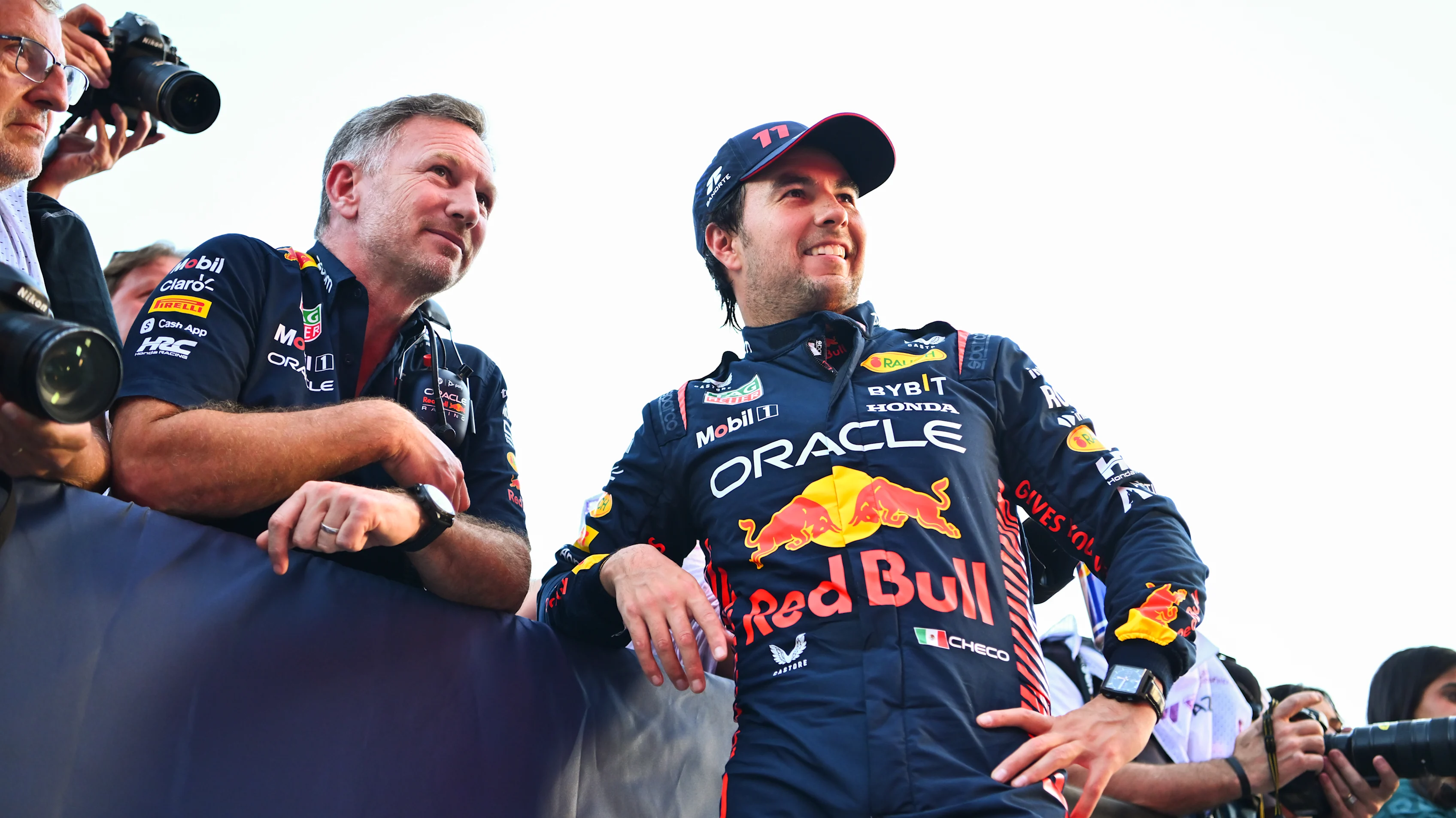 BAKU, AZERBAIJAN - APRIL 29: Sprint winner Sergio Perez of Mexico and Oracle Red Bull Racing talks with Red Bull Racing Team Principal Christian Horner in parc ferme during the Sprint ahead of the F1 Grand Prix of Azerbaijan at Baku City Circuit on April 29, 2023 in Baku, Azerbaijan. (Photo by Dan Mullan - Formula 1/Formula 1 via Getty Images)