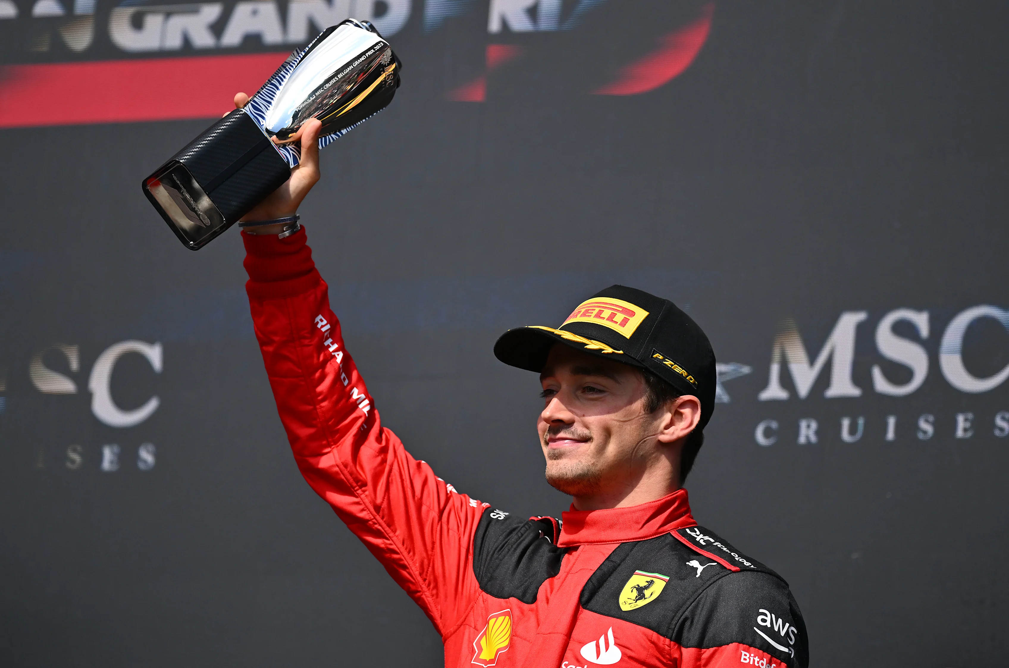 SPA, BELGIUM - JULY 30: Third placed Charles Leclerc of Monaco and Ferrari celebrates on the podium